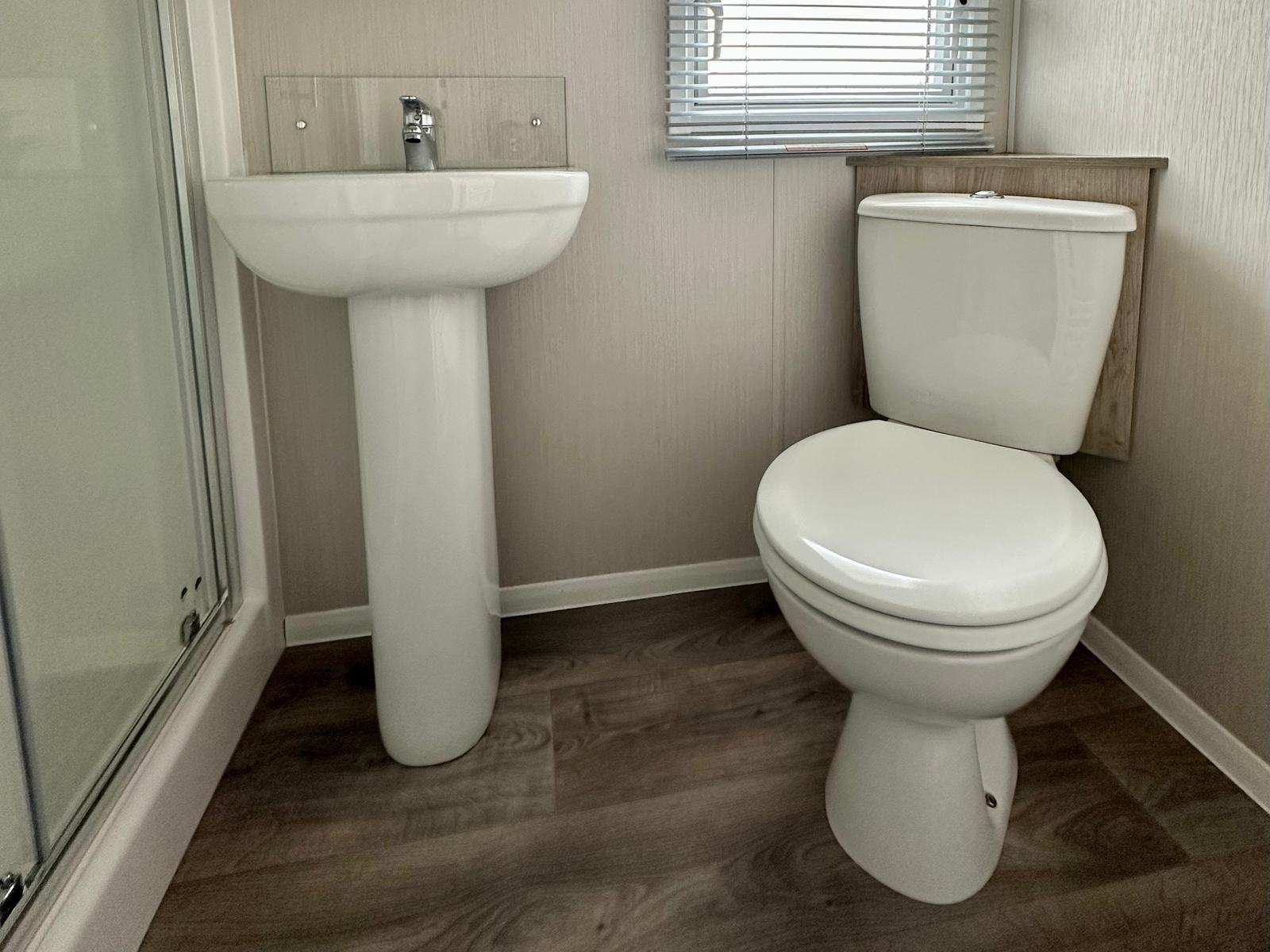 Family bathroom in the Willerby Linwood 2022 caravan at Windy Harbour Holiday Park