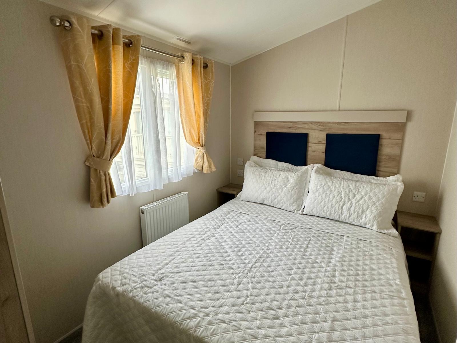 Master bedroom with double bed in the Willerby Linwood 2022 caravan at Windy Harbour Holiday Park