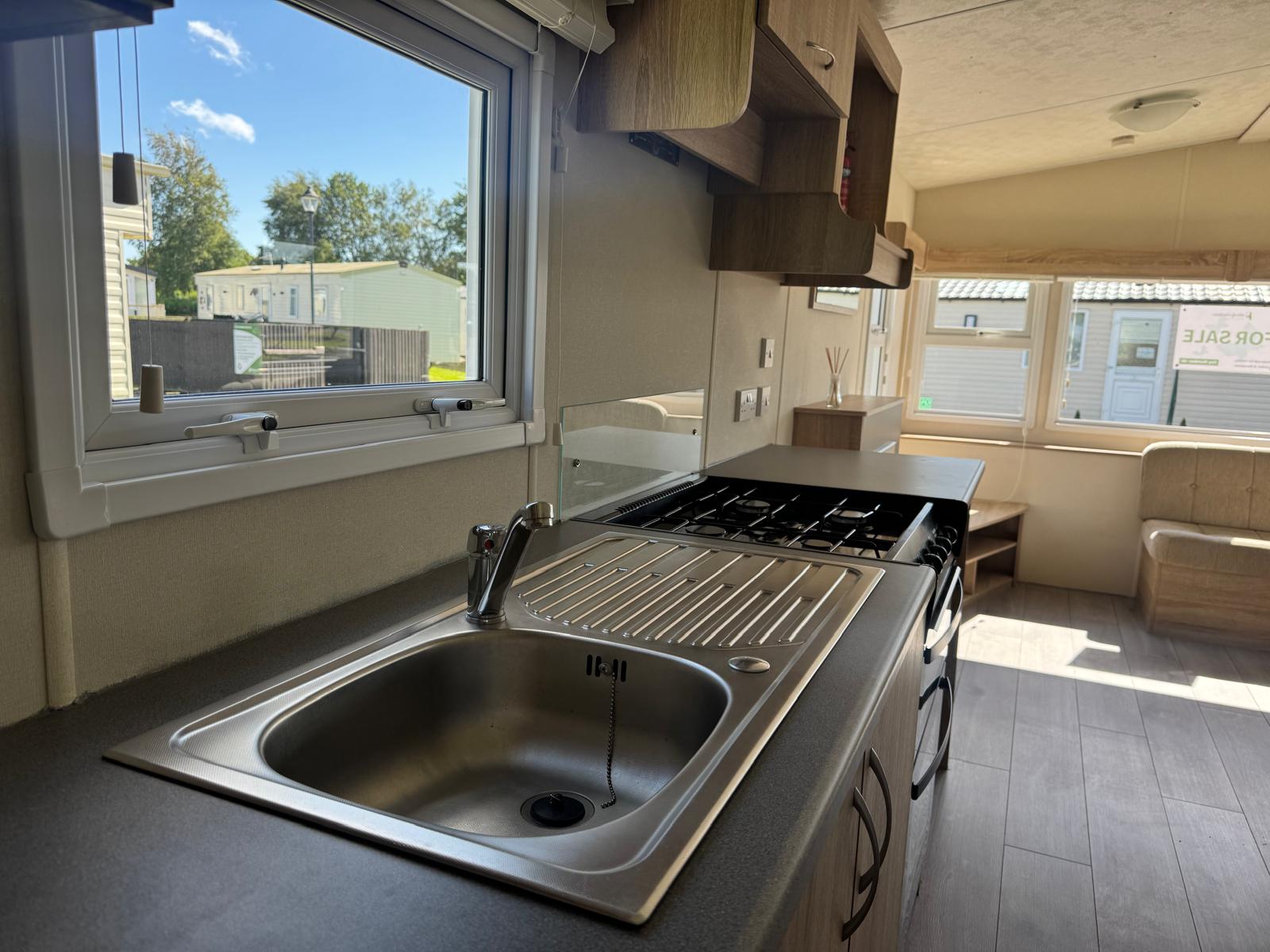 Sink area and kitchen window in Delta Santana 2019 caravan at Windy Harbour Holiday Park