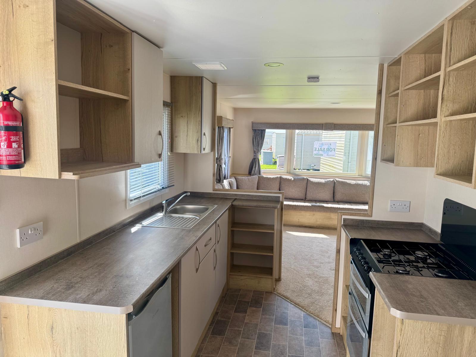 Living area and gally kitchen in the aBI Horizon 2019 caravan at Windy Harbour Holiday Park