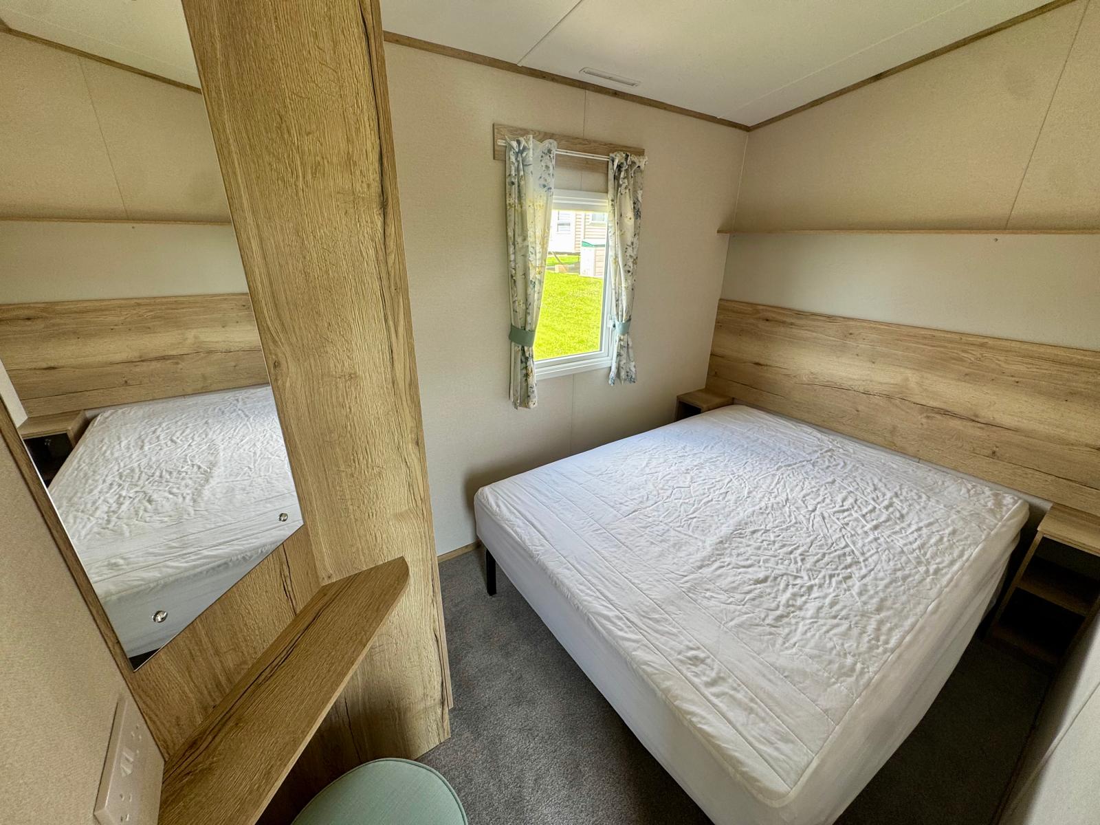 Master bedroom in the ABI Coworth 2024 caravan at Wardleys Creek Holiday Park
