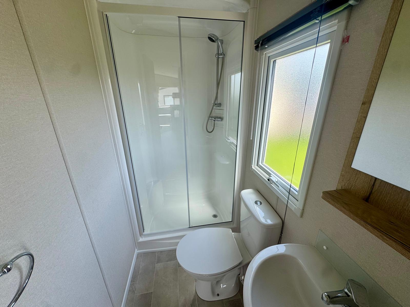 Family bathroom in the ABI Coworth 2024 caravan at Wardleys Creek Holiday Park