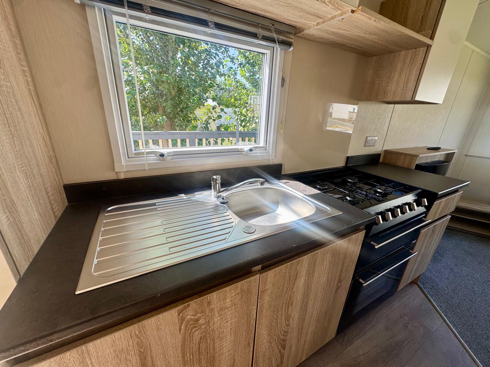 Kitchen area in the Willerby Mistral 2020 caravan at Tarn House Holiday Park