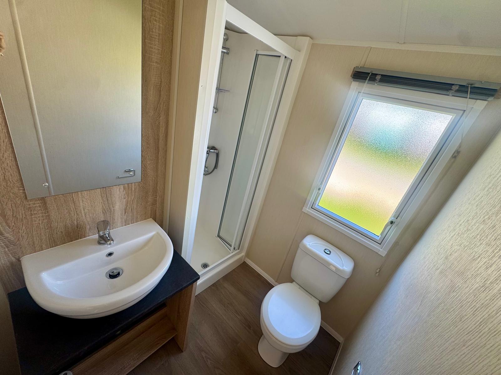 Family bathroom in the Willerby Mistral 2020 caravan at Tarn House Holiday Park