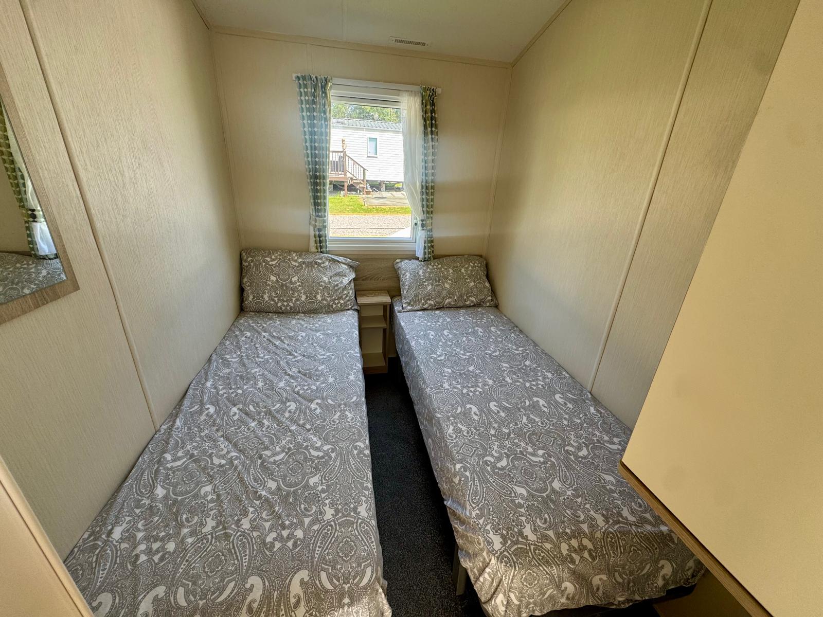 Twin bedroom in the Willerby Mistral 2020 caravan at Tarn House Holiday Park