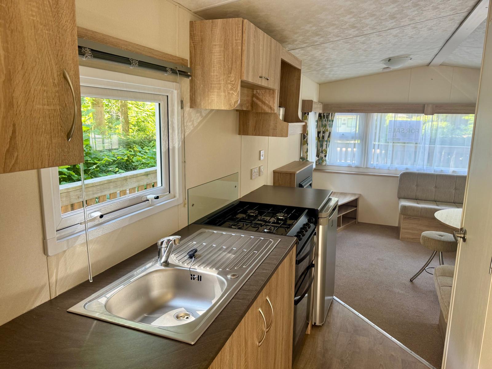 Galley kitchen in the Delta Santana 2019 caravan at Black Beck Holiday Park