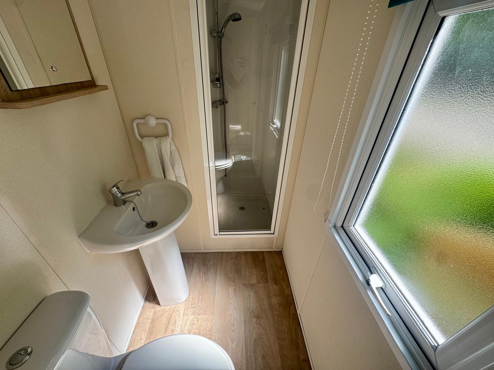 Family bathroom in the Delta Santana 2019 caravan at Black Beck Holiday Park