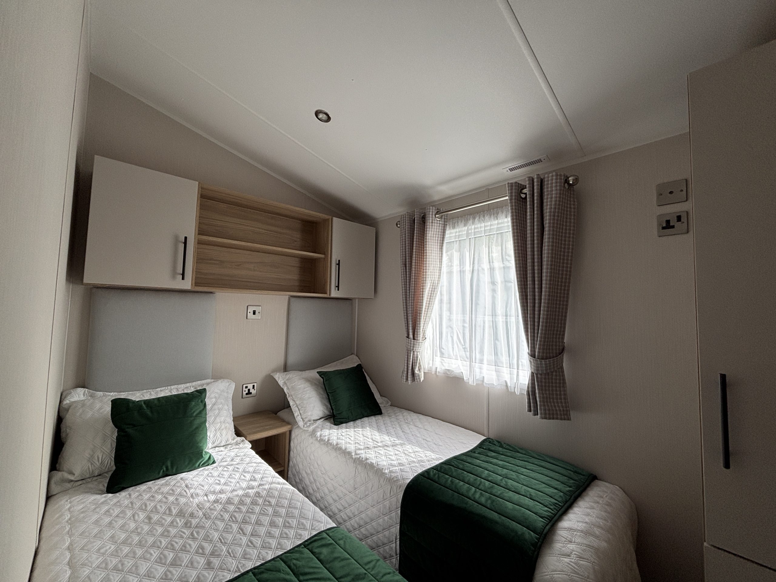 Twin bedroom in the Willerby Manor 2023 caravan on Riverside 3 at Windy Harbour Holiday Park