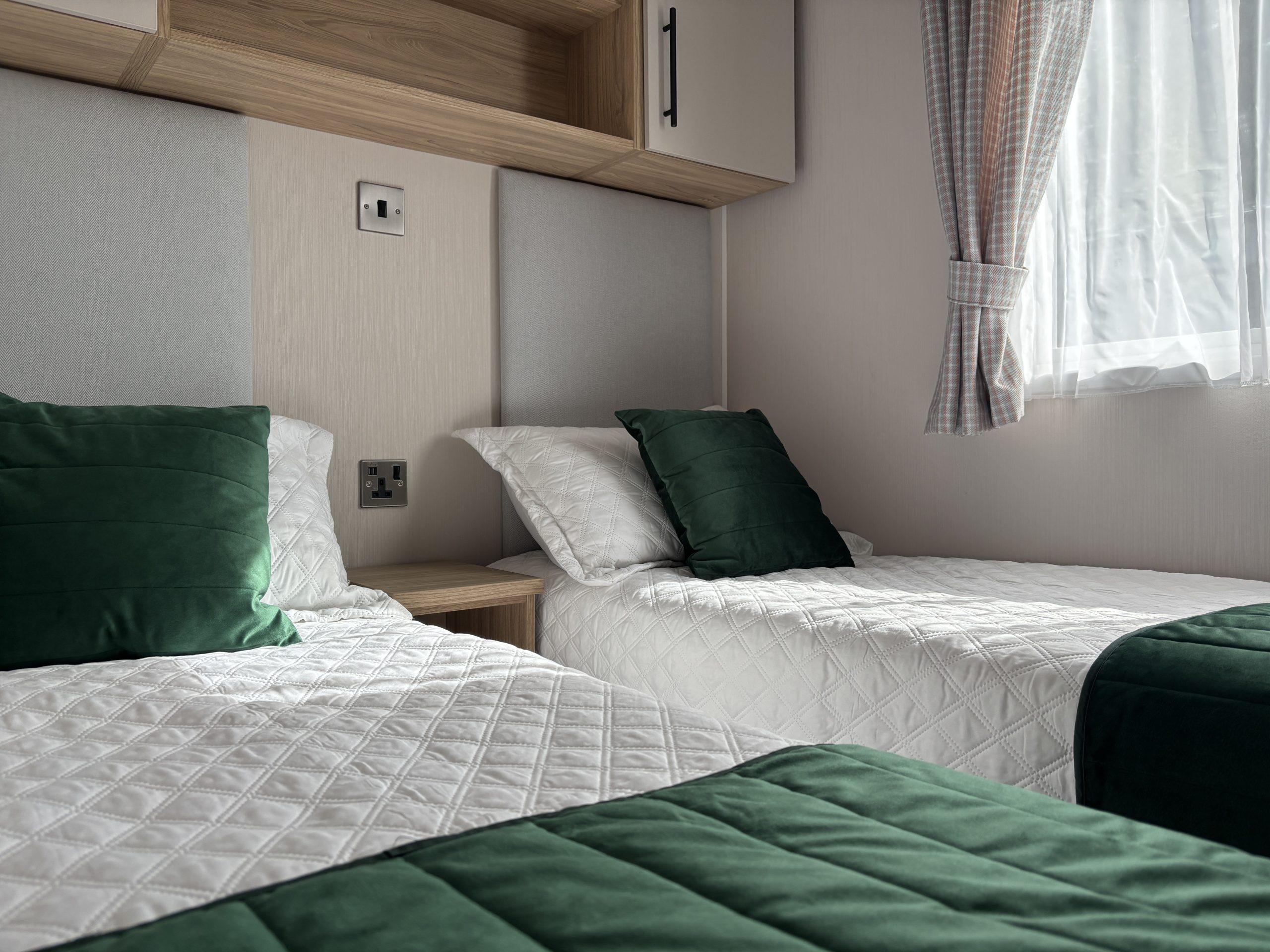 Twin bedroom in the Willerby Manor 2023 caravan on Riverside 3 at Windy Harbour Holiday Park