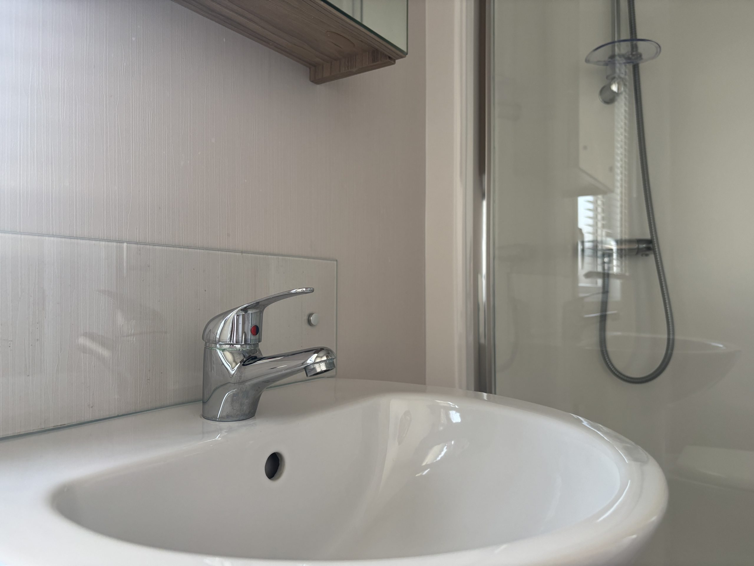 Family bathroom in the Willerby Manor 2023 caravan on Riverside 3 at Windy Harbour Holiday Park