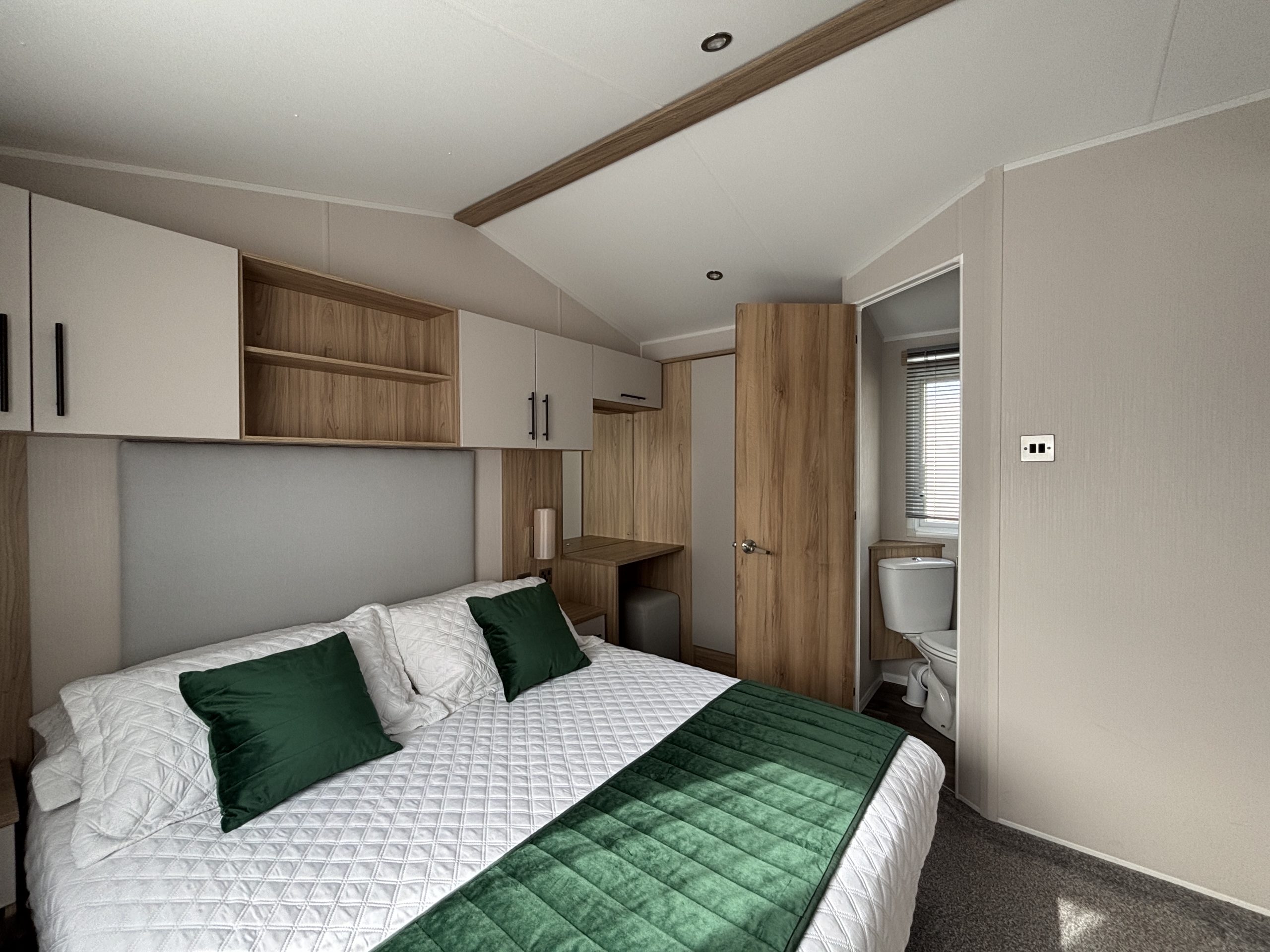 Master bedroom in the Willerby Manor 2023 caravan on Riverside 3 at Windy Harbour Holiday Park