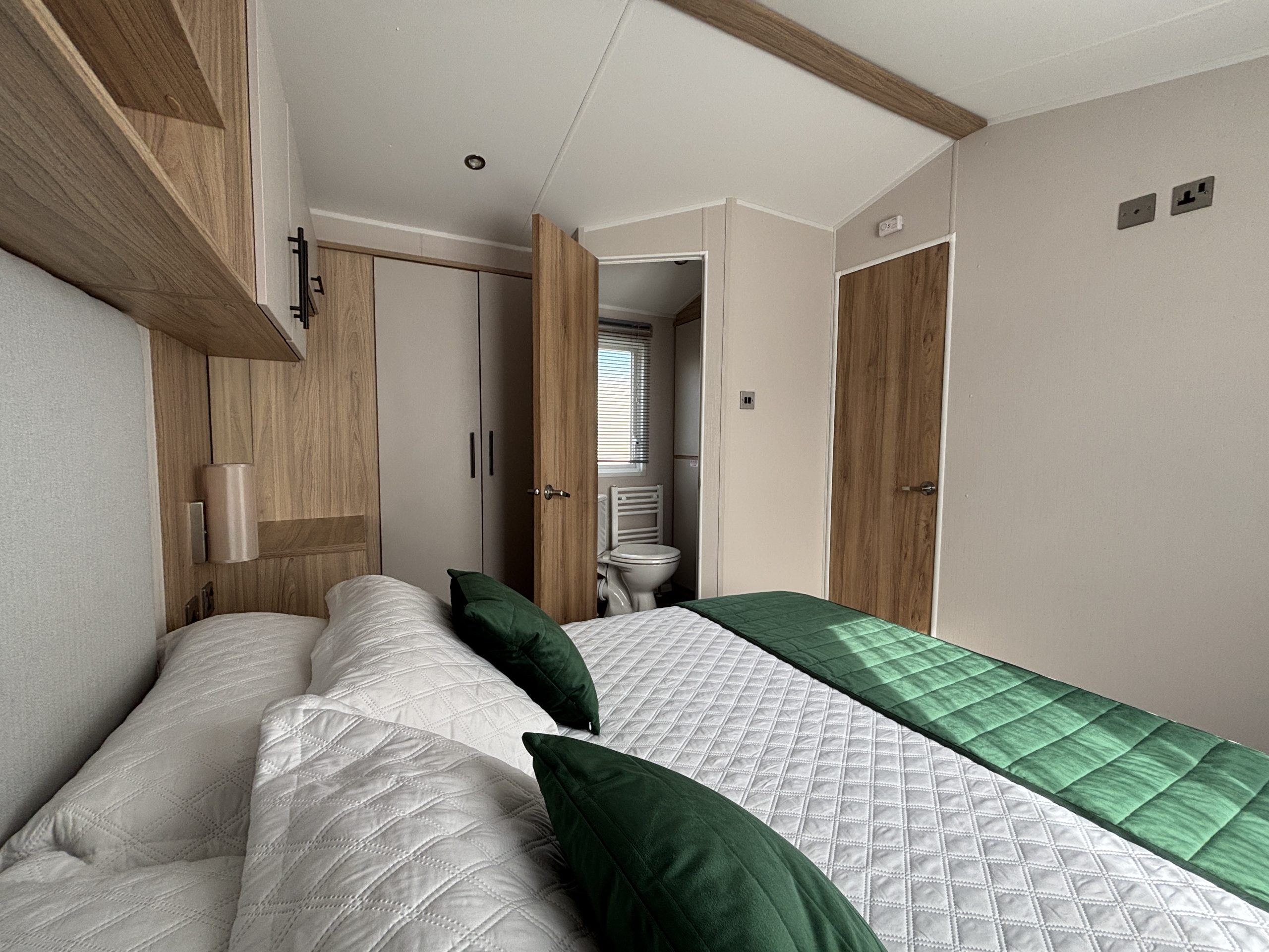 Master bedroom in the Willerby Manor 2023 caravan on Riverside 3 at Windy Harbour Holiday Park