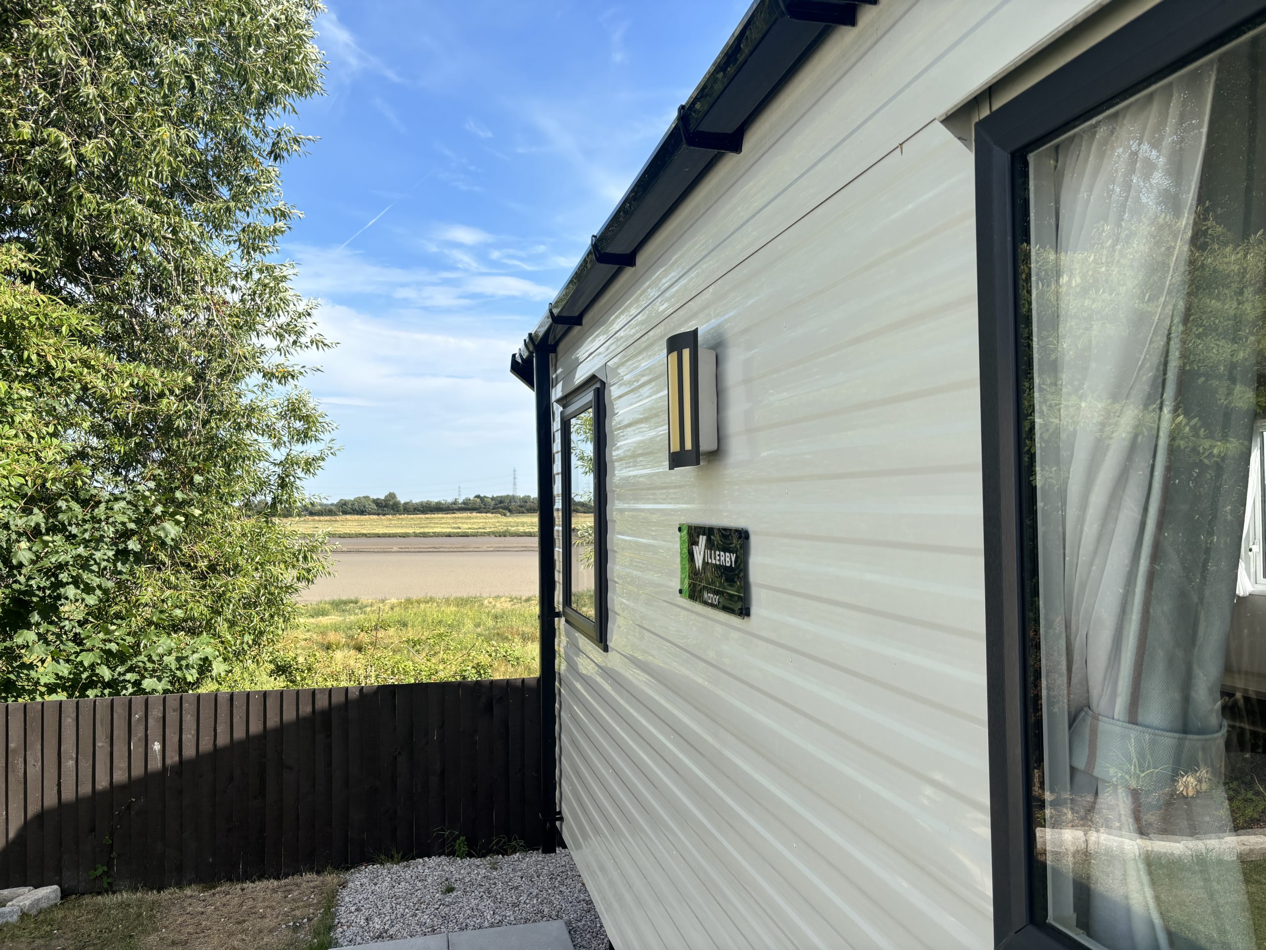 External shot in the Willerby Manor 2023 caravan on Riverside 3 at Windy Harbour Holiday Park