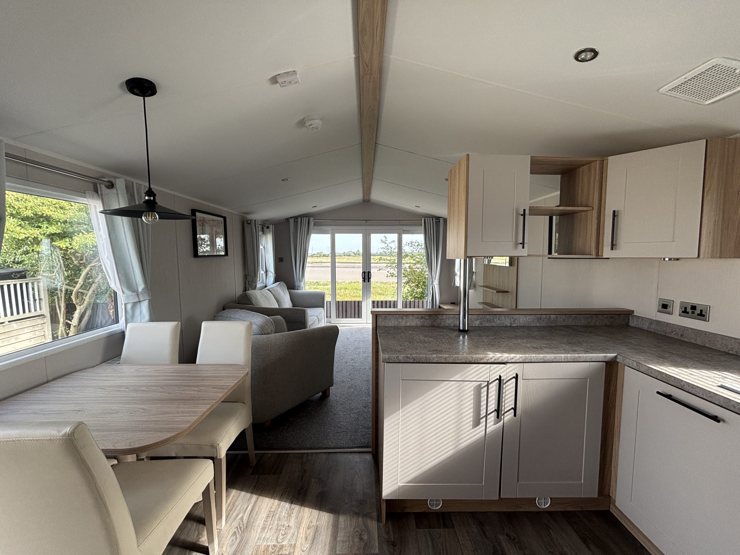 Living area in the Willerby Manor 2023 caravan on Riverside 3 at Windy Harbour Holiday Park