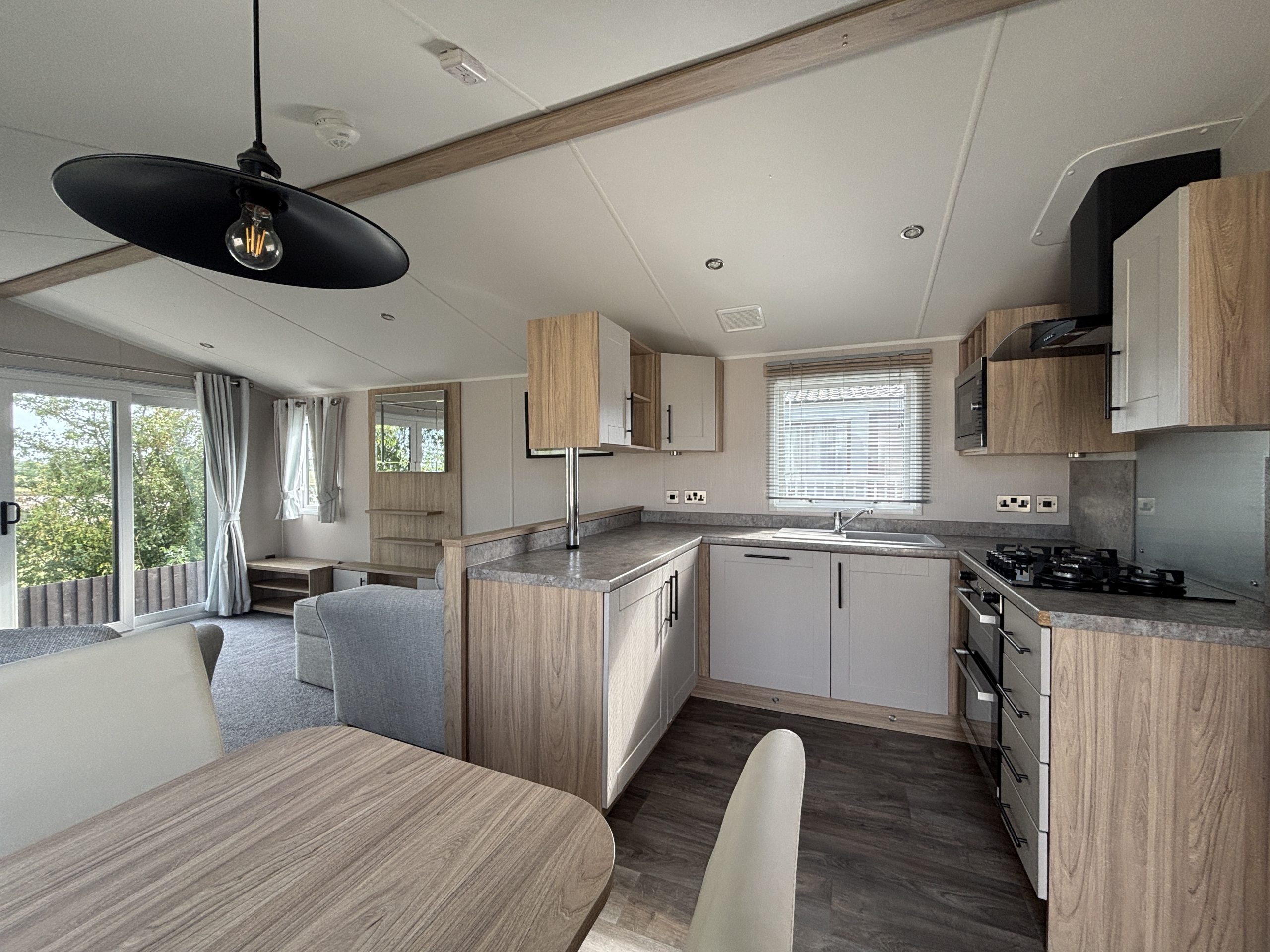 Living area in the Willerby Manor 2023 caravan on Riverside 3 at Windy Harbour Holiday Park