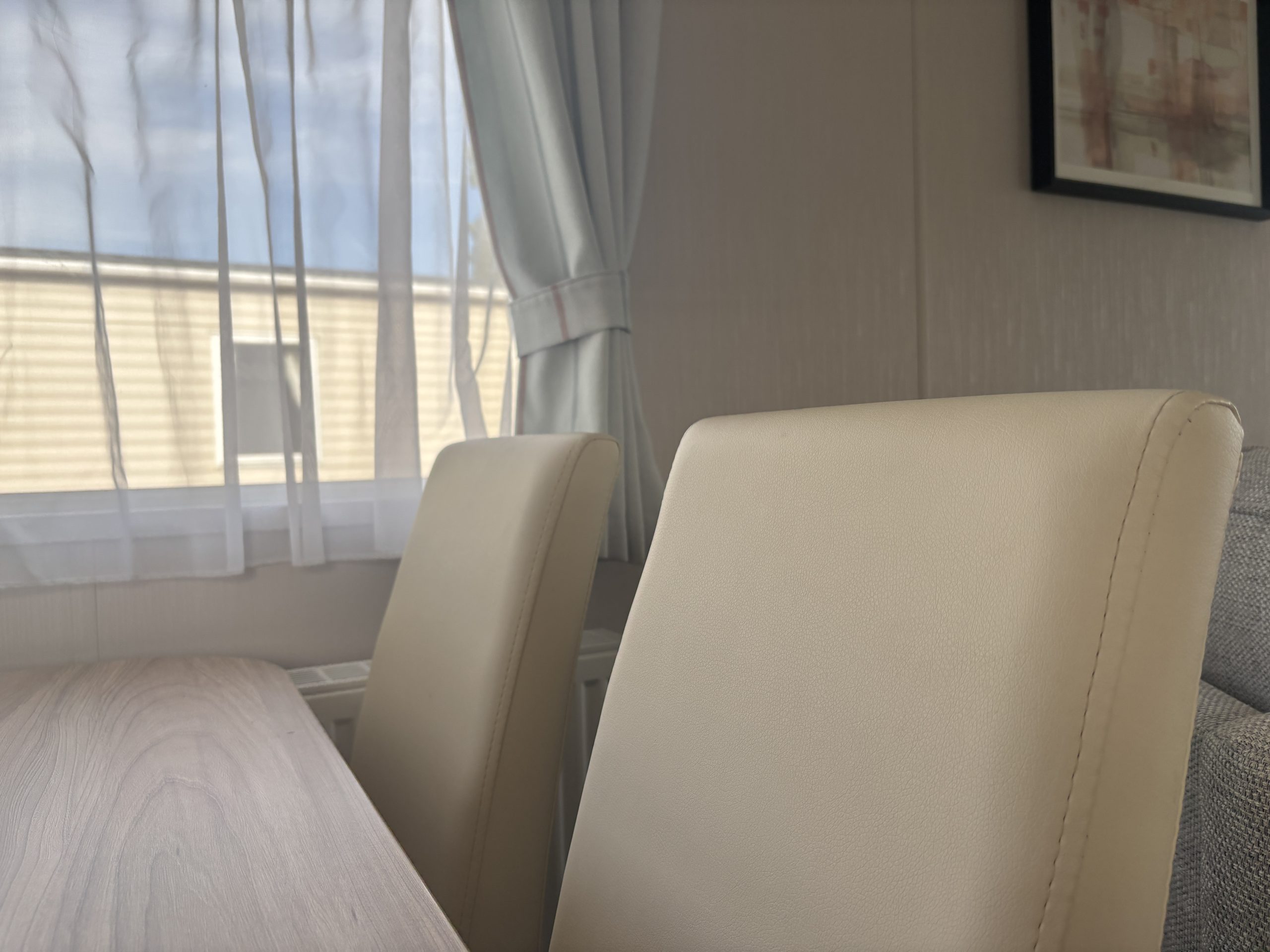 Dining area in the Willerby Manor 2023 caravan on Riverside 3 at Windy Harbour Holiday Park