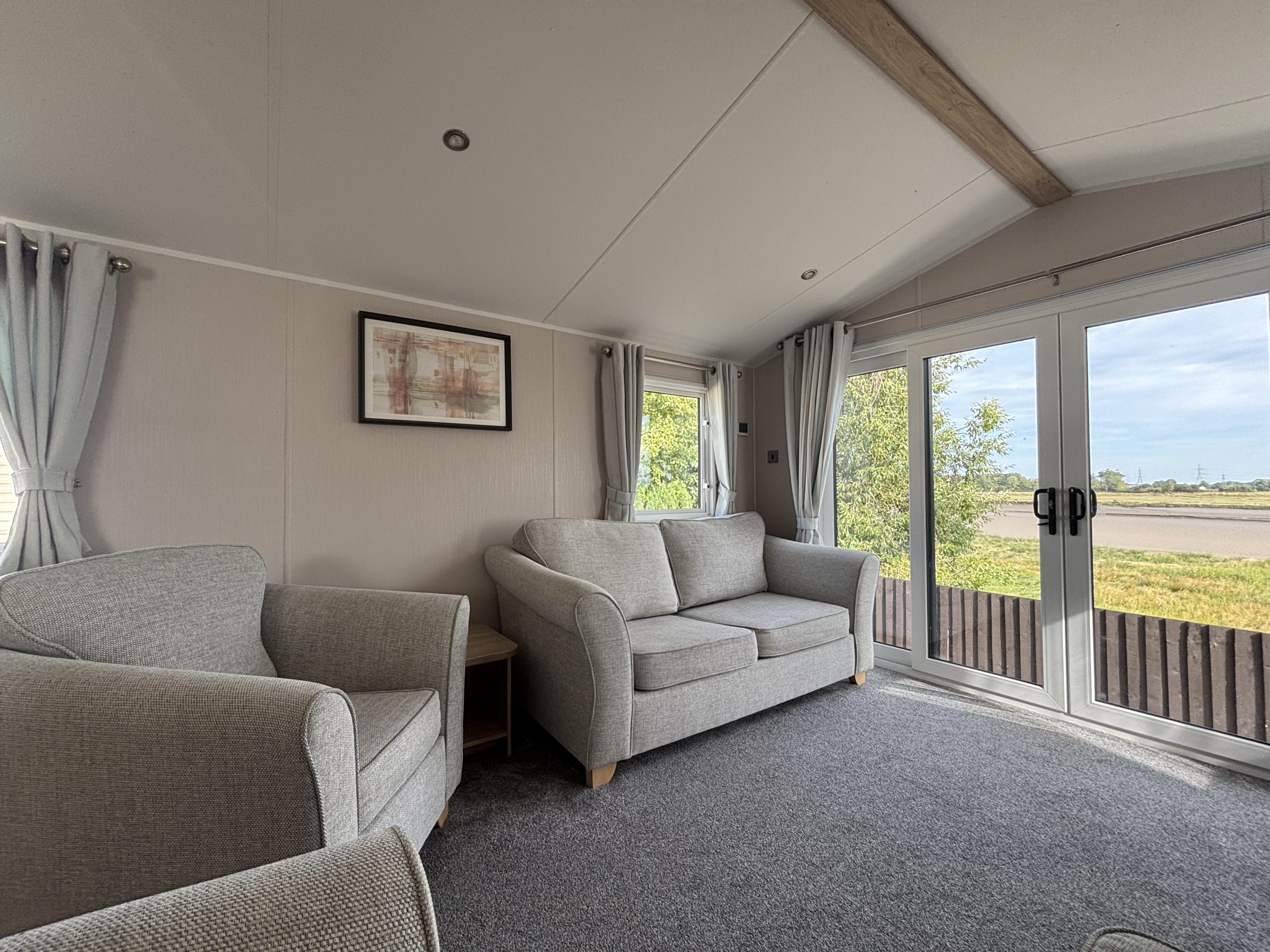 Living area in the Willerby Manor 2023 caravan on Riverside 3 at Windy Harbour Holiday Park