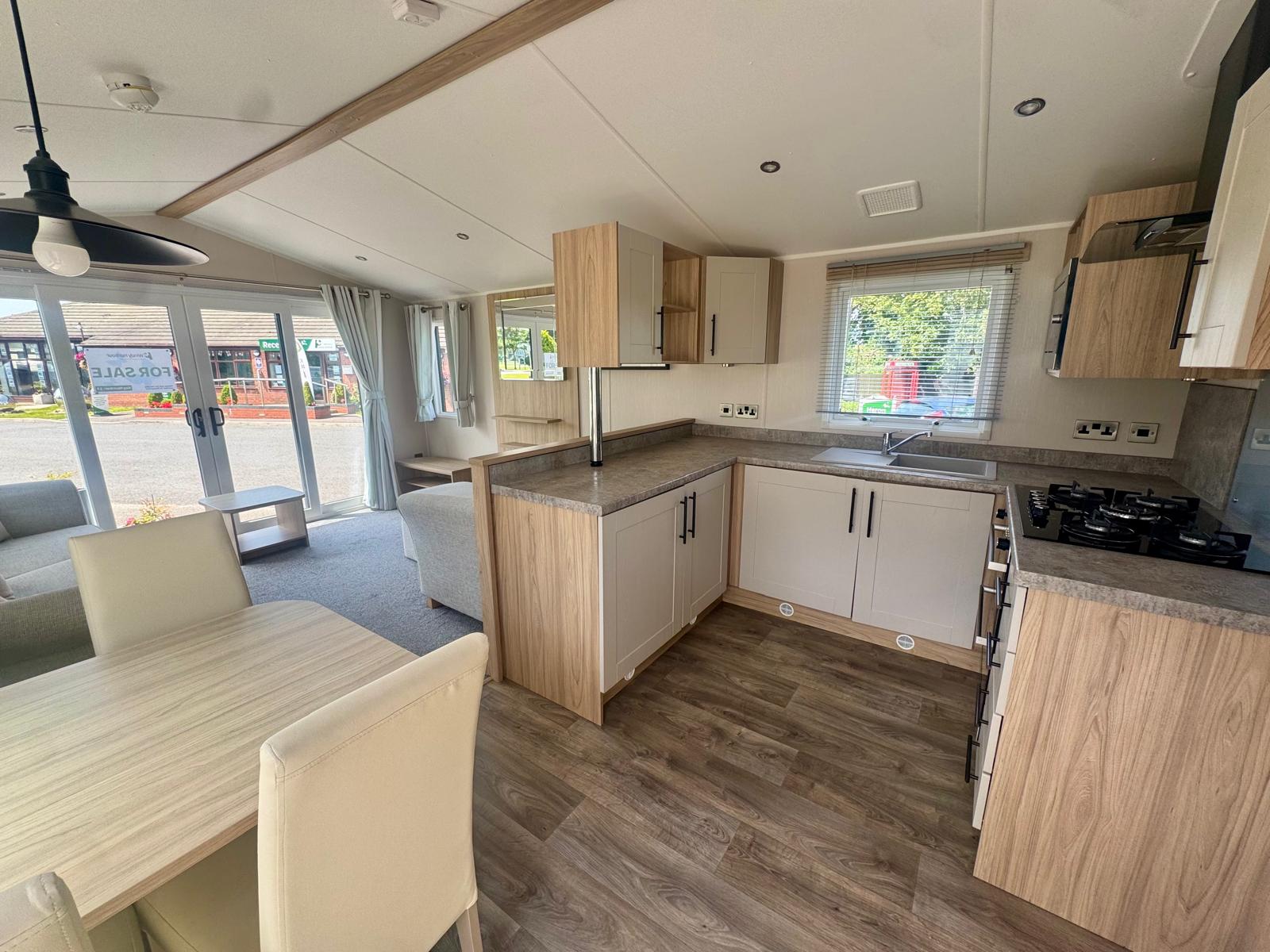 Kitchen area in the Willerby Manor 2023 at Windy Harbour Holiday Park