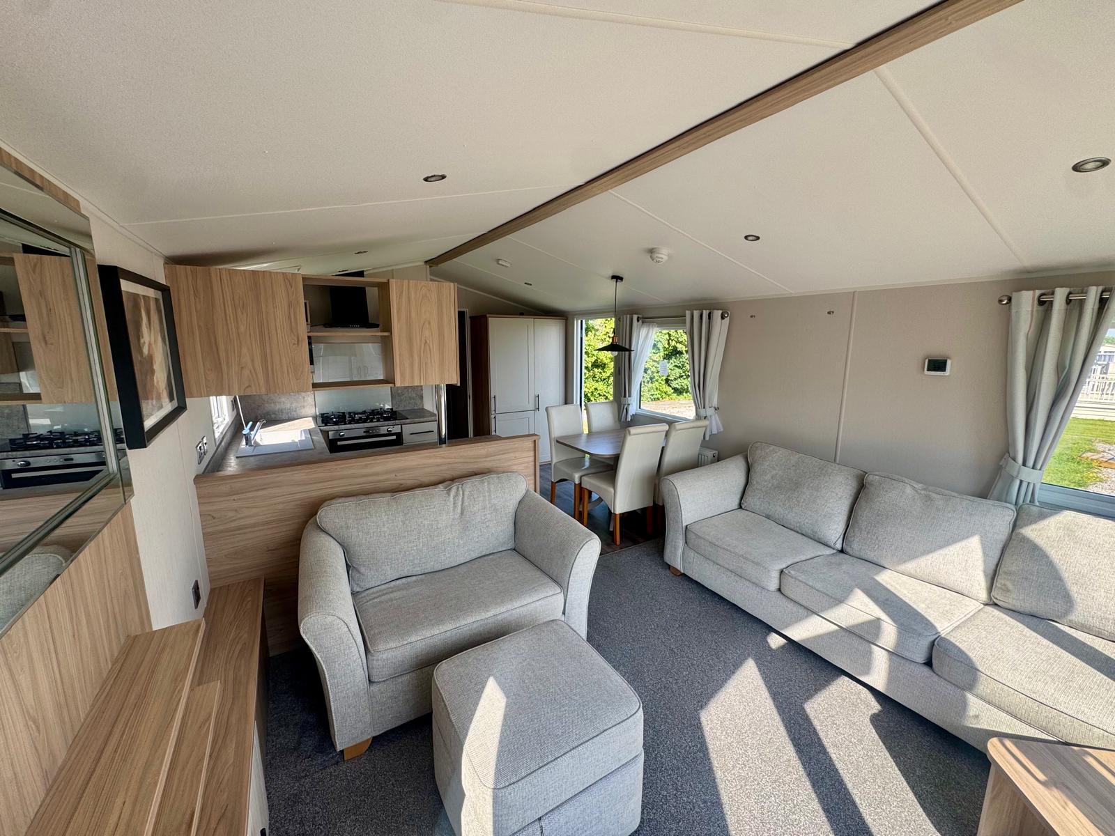 Open plan living space in the Willerby Manor 2023 caravan at Windy Harbour Holiday Park