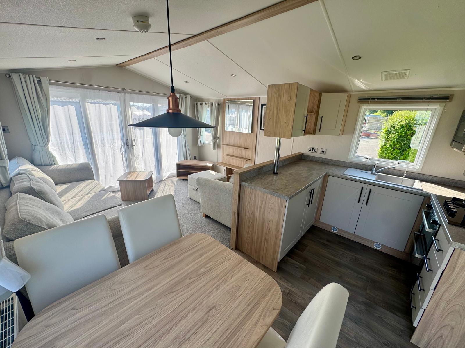Open plan living space in the Willerby Manor 2023 caravan at Windy Harbour Holiday Park