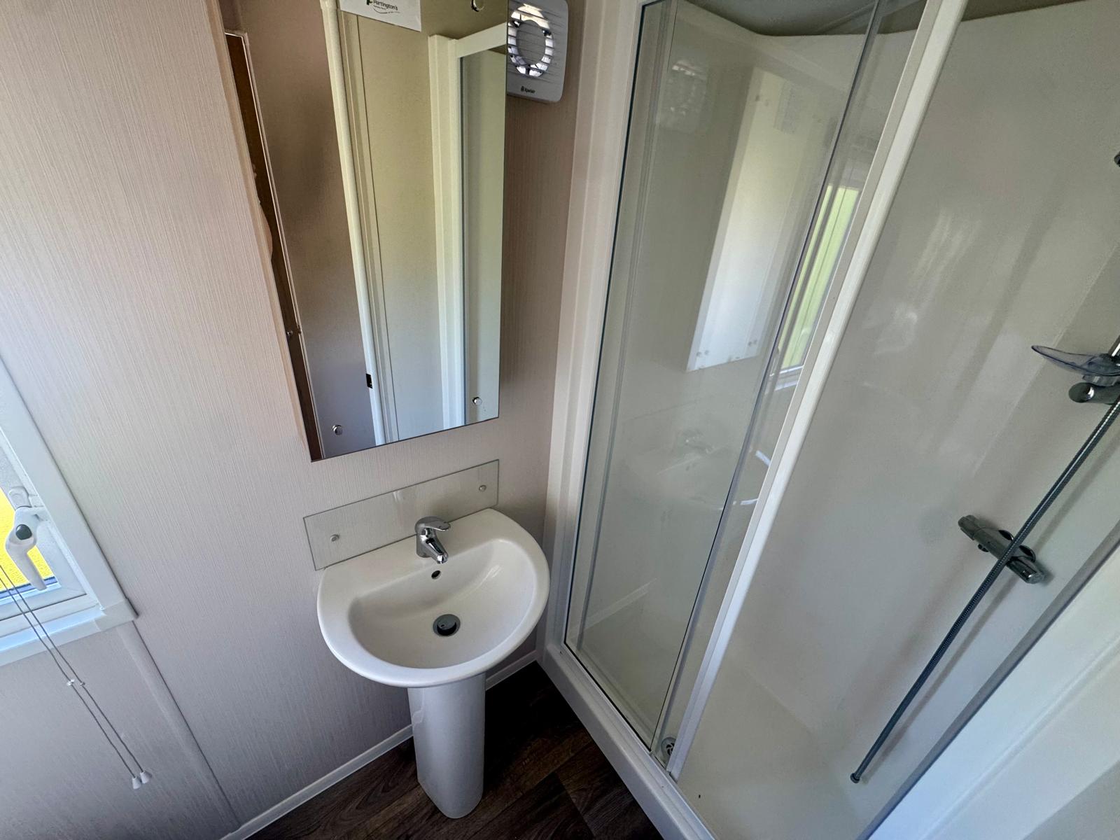 Family bathroom in the Willerby Manor 2023 caravan at Windy Harbour Holiday Park