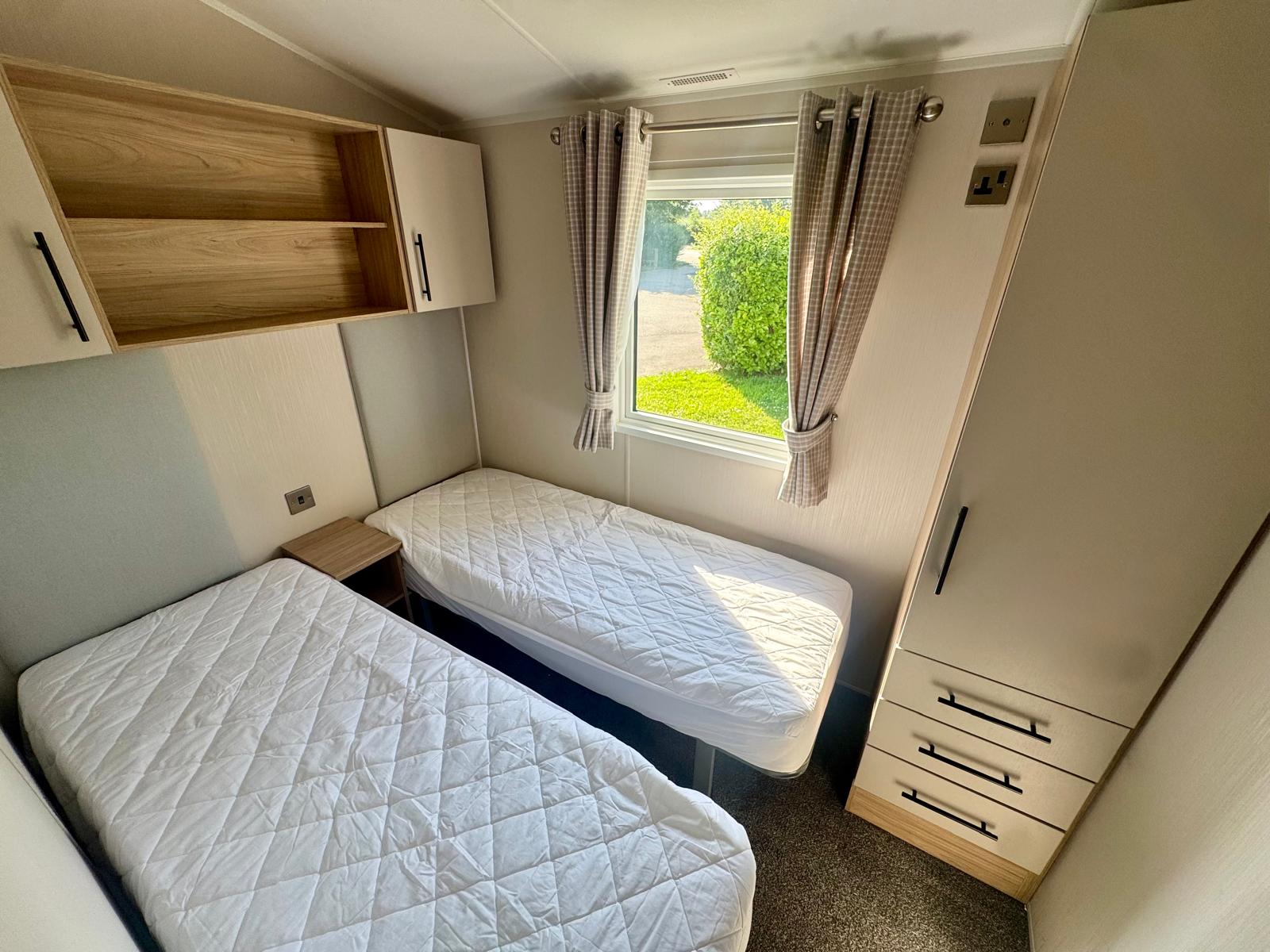 Twin bedroom in the Willerby Manor 2023 caravan at Windy Harbour Holiday Park