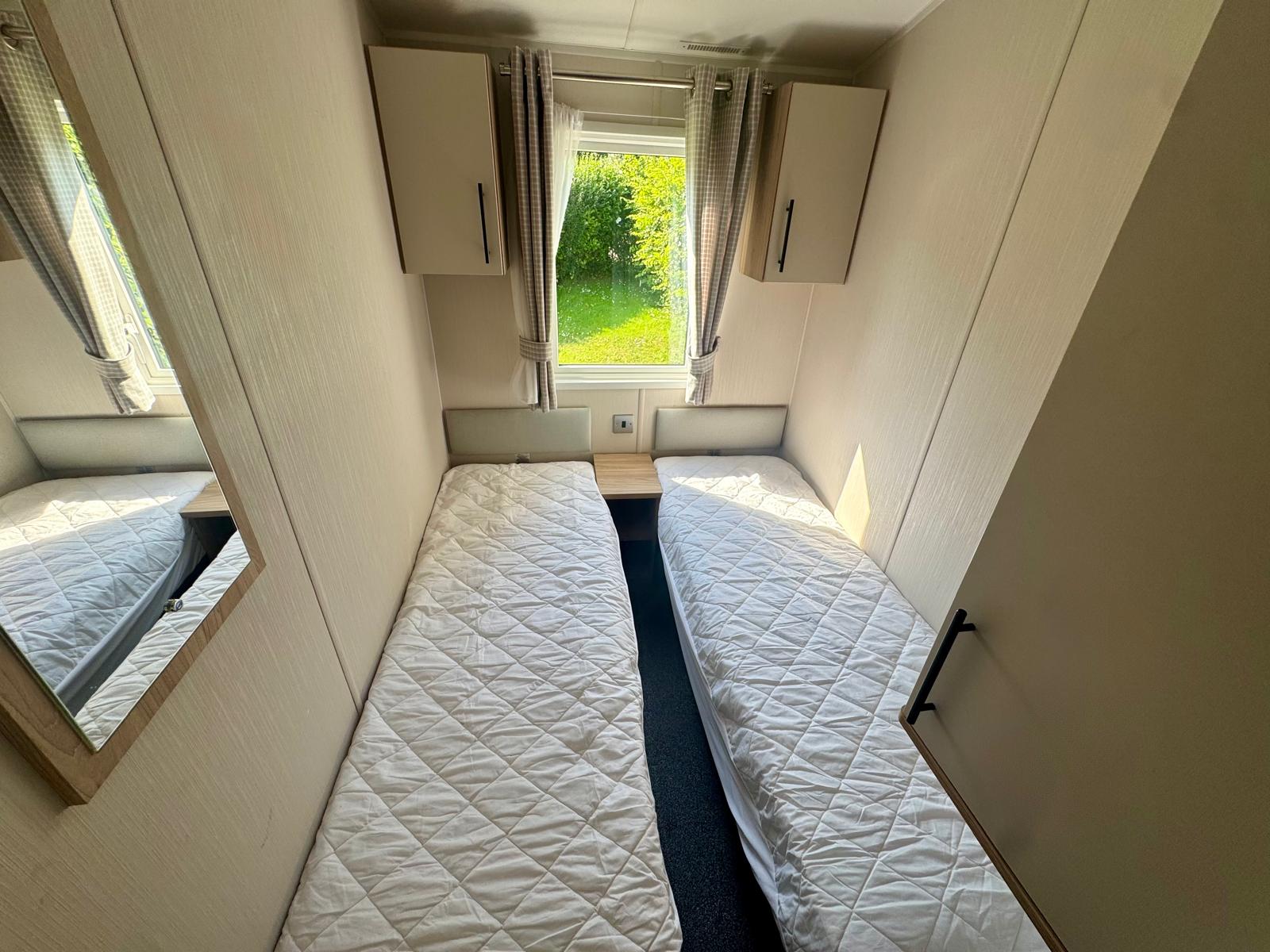 Twin bedroom in the Willerby Manor 2023 caravan at Windy Harbour Holiday Park