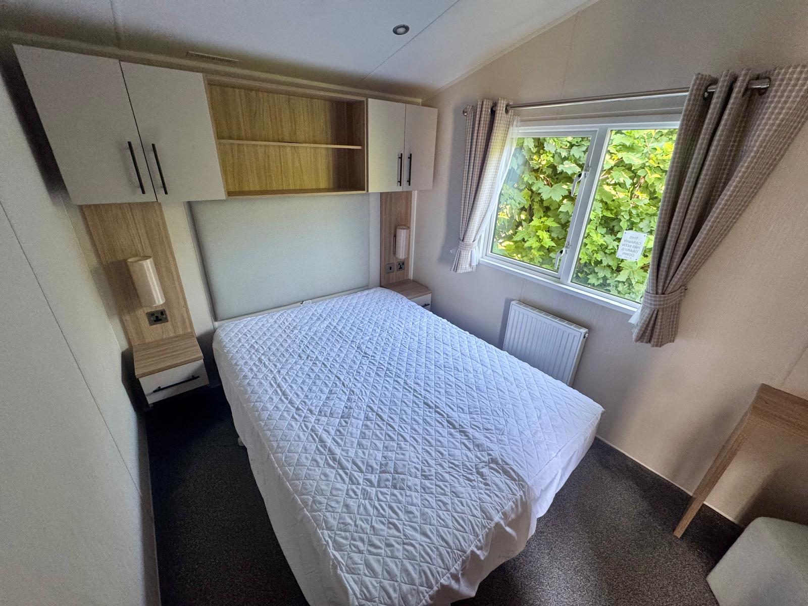 Master bedroom in the Willerby Manor 2023 caravan at Windy Harbour Holiday Park