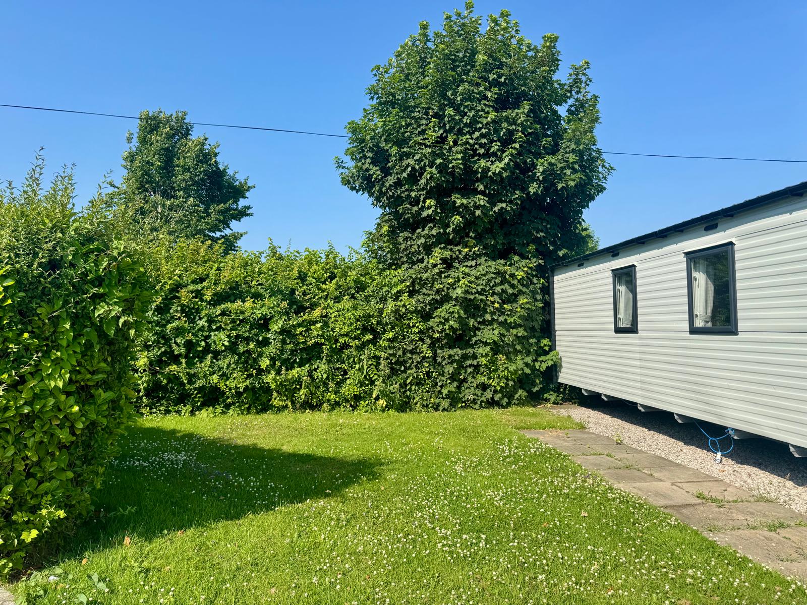 External space for the Willerby Manor 2023 caravan at Windy Harbour Holiday Park