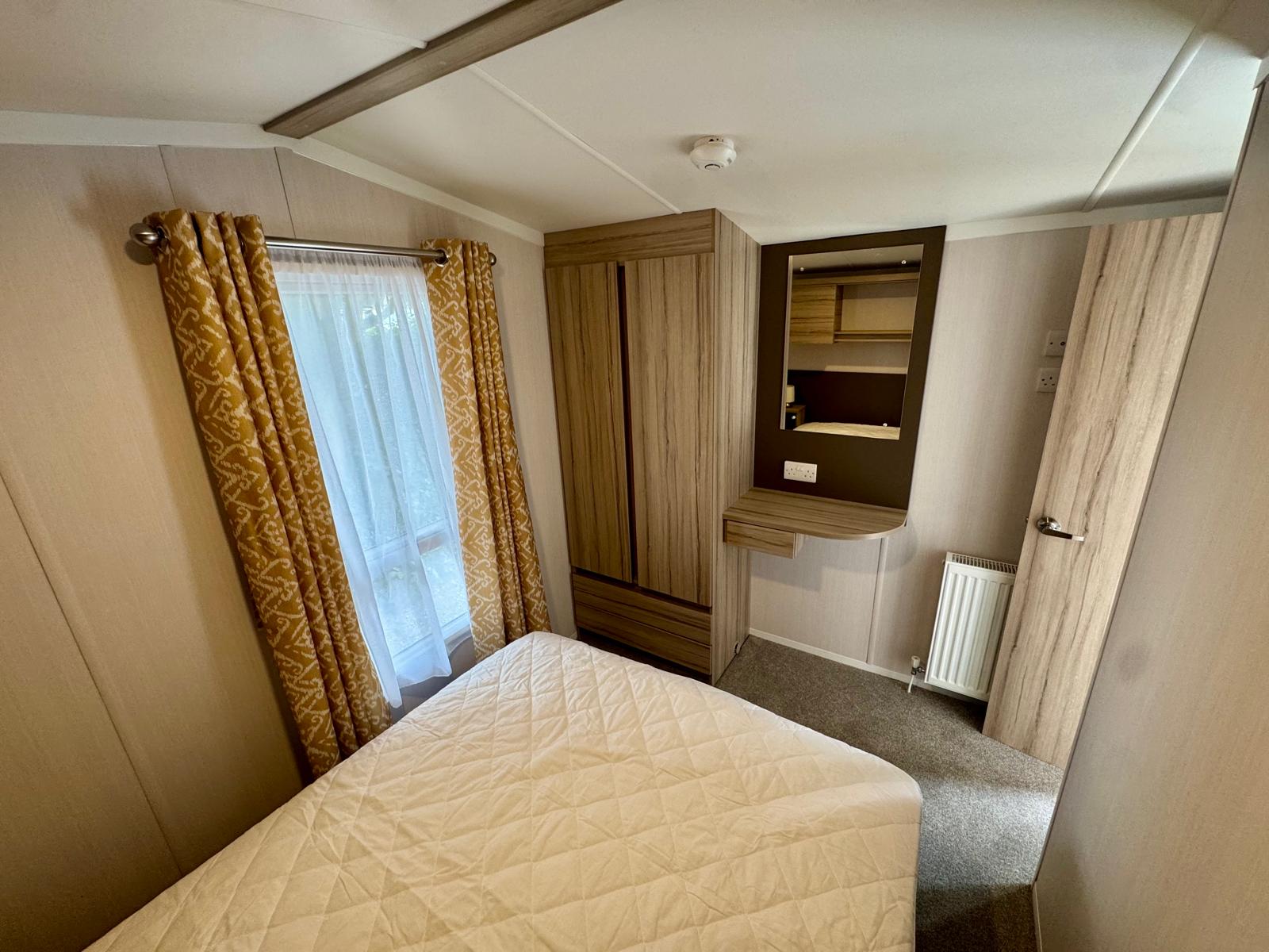 Master bedroom in the Swift Loire 2026 caravan at Tarn House Holiday Park Skipton
