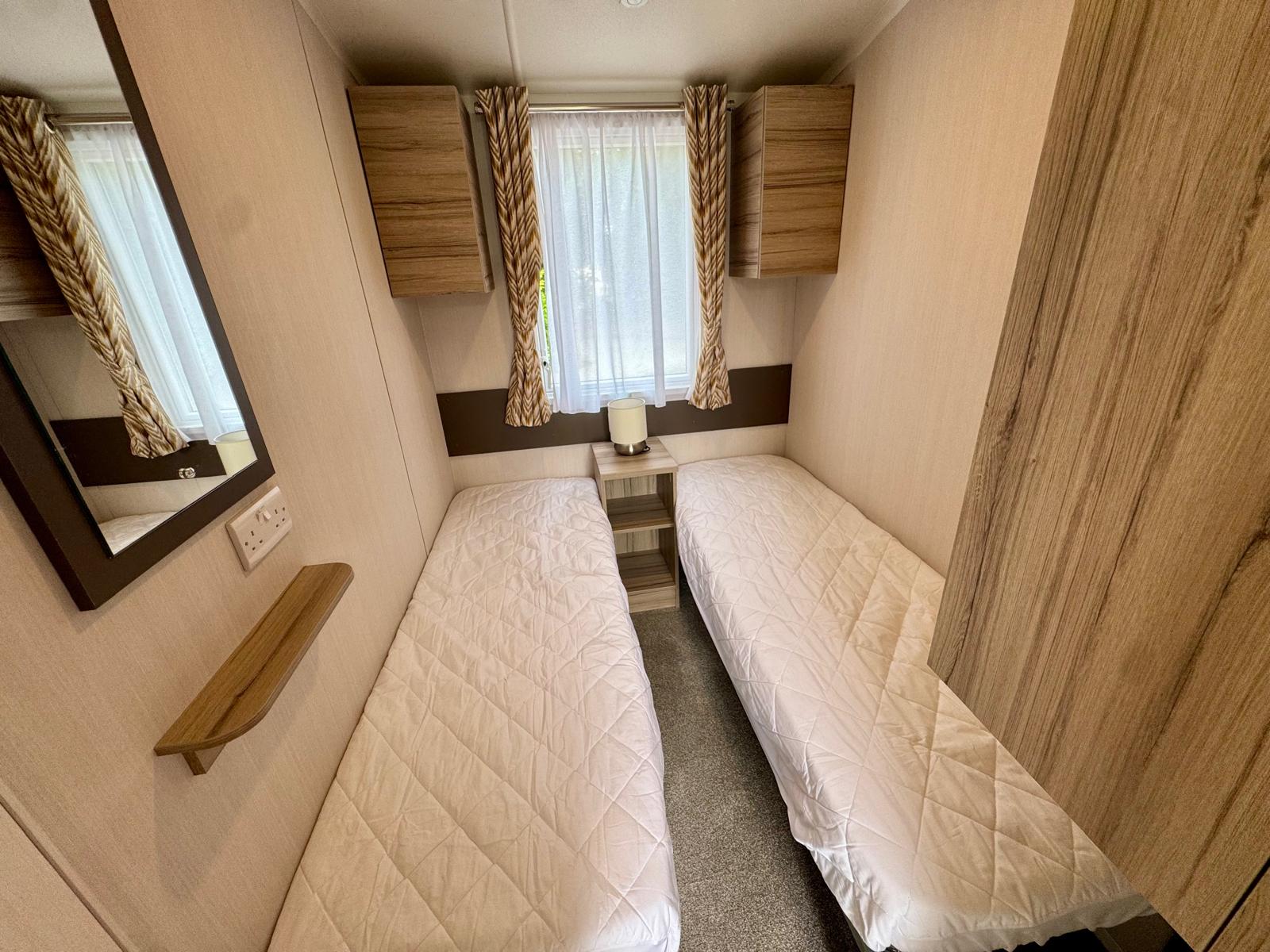 Twin bedroom in the Swift Loire 2026 caravan at Tarn House Holiday Park Skipton