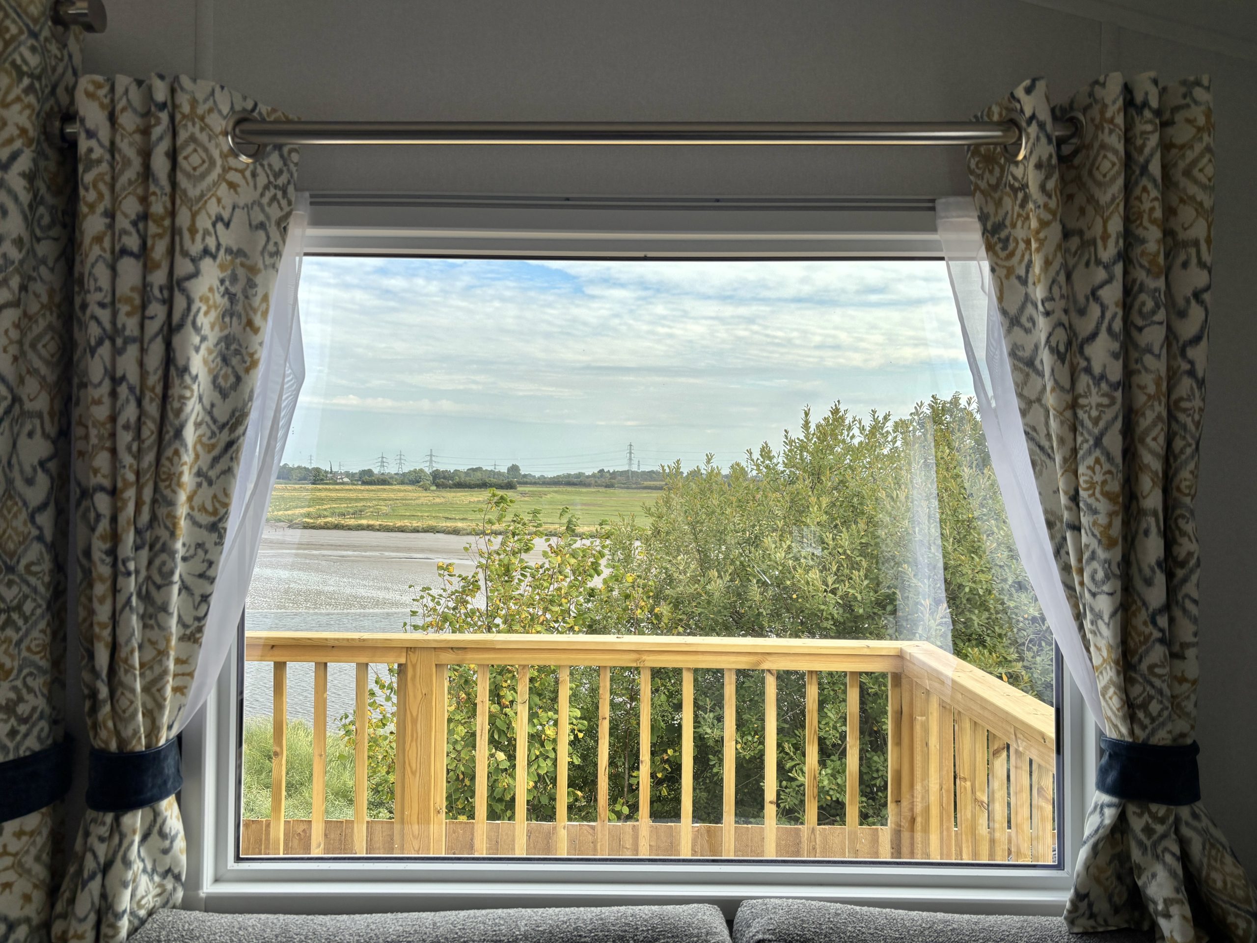 Image of the view of the river from the living area in the Willerby Ashcroft 2026 at Windy Harbour Holiday Park, Partington's