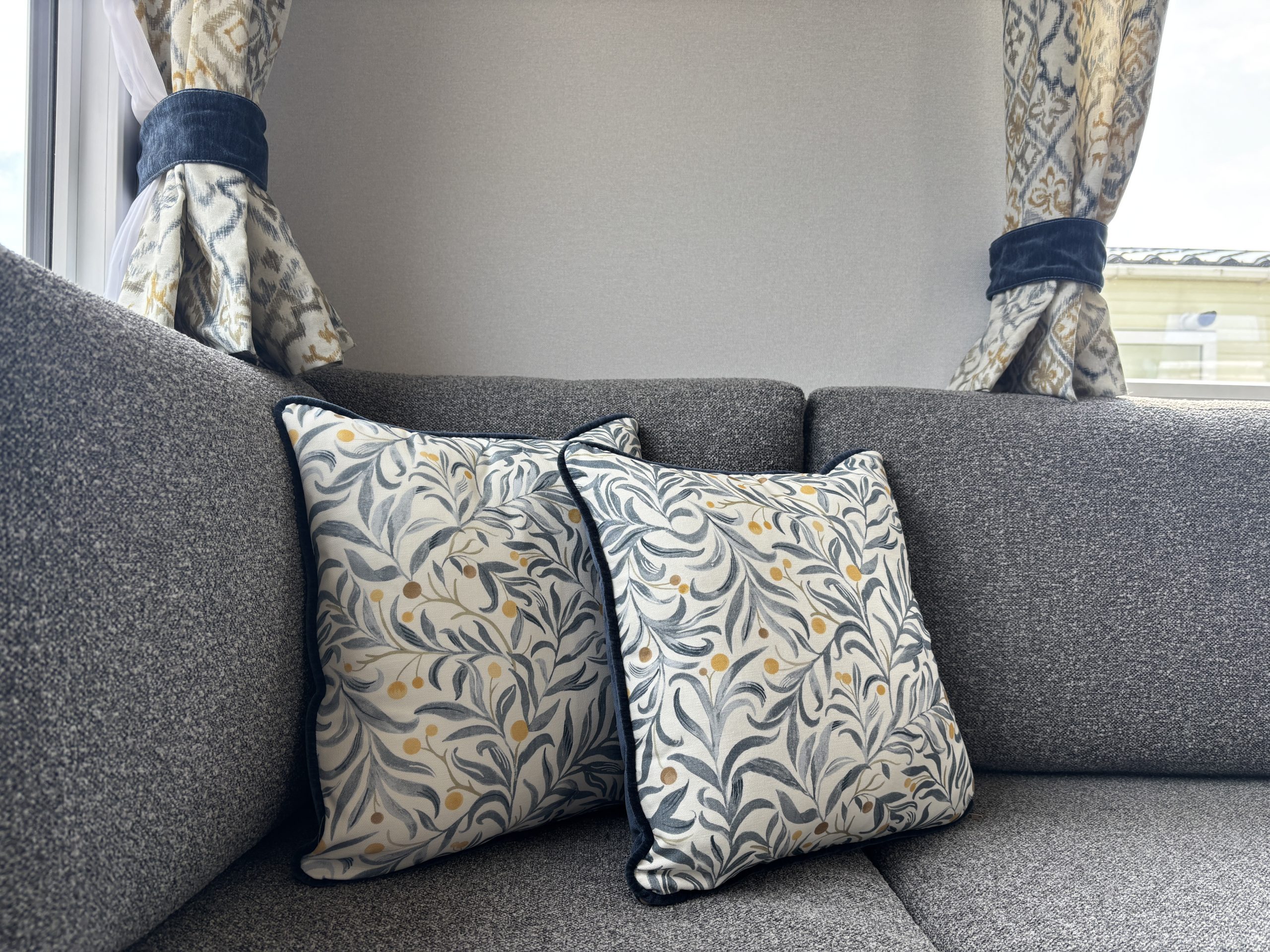 Detail shot of the decorative cushions in the Willerby Ashcroft 2026 at Windy Harbour Holiday Park, Partington's