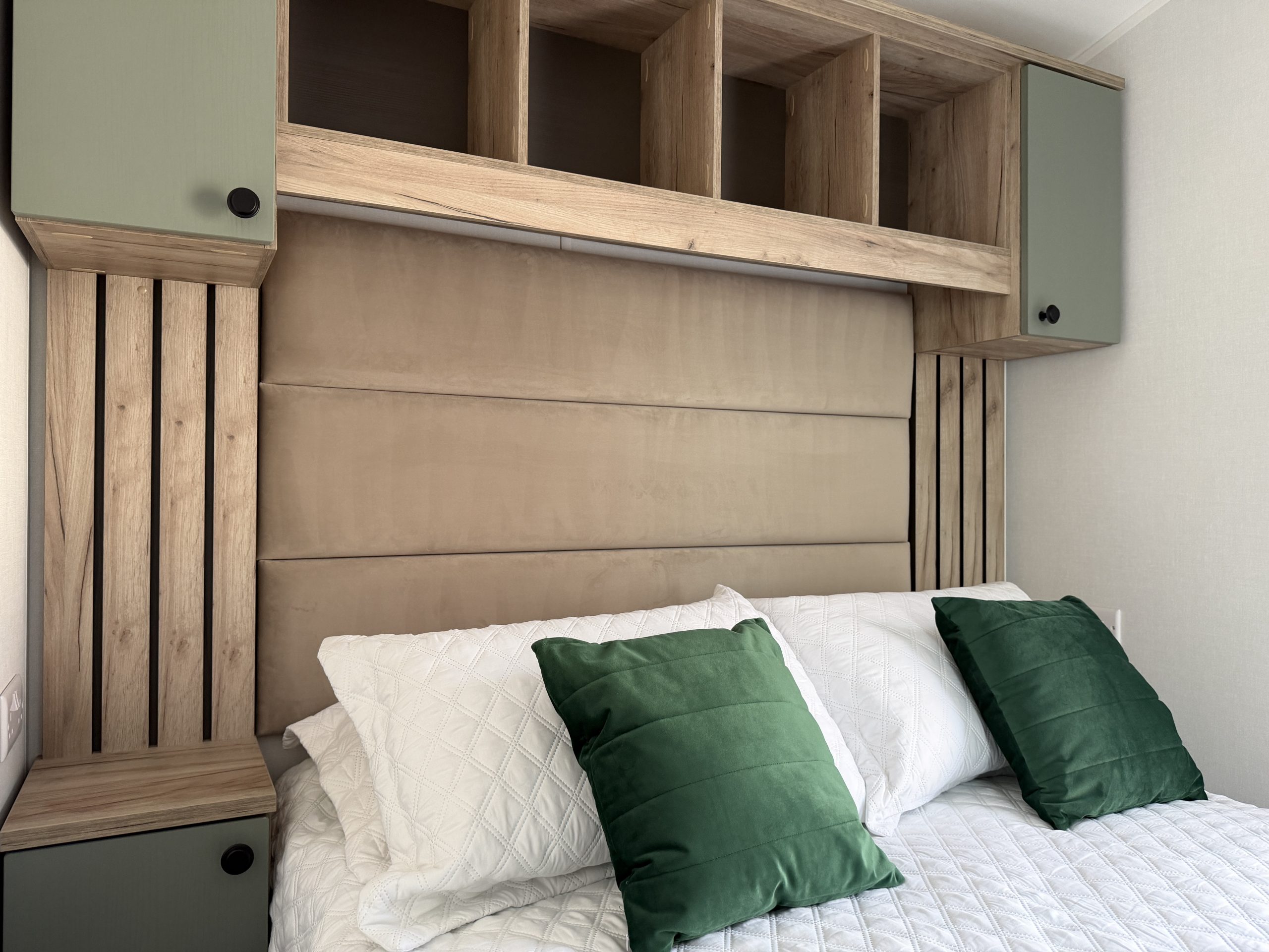 Picture showing the bed. and head board with built in storage of the Willerby Buxton 2026