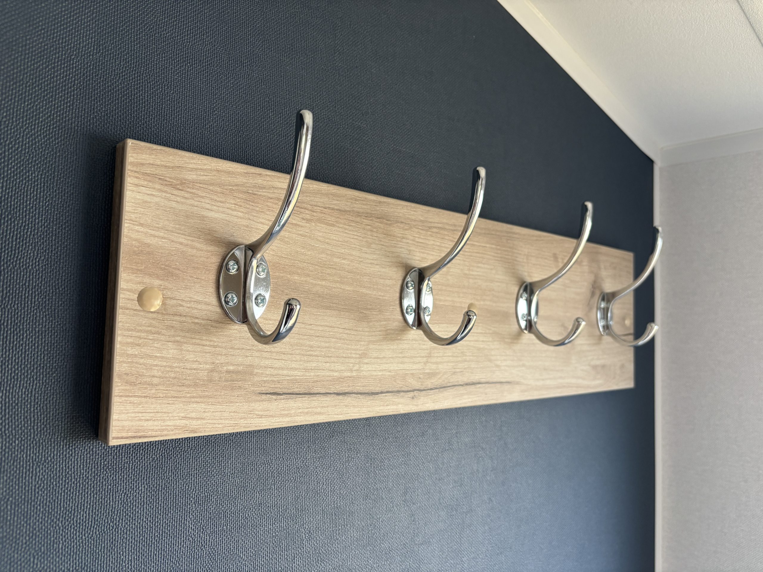 Detailed shot of the coat hooks in the Willerby Ashcroft 2026 at Windy Harbour Holiday Park, Partington's
