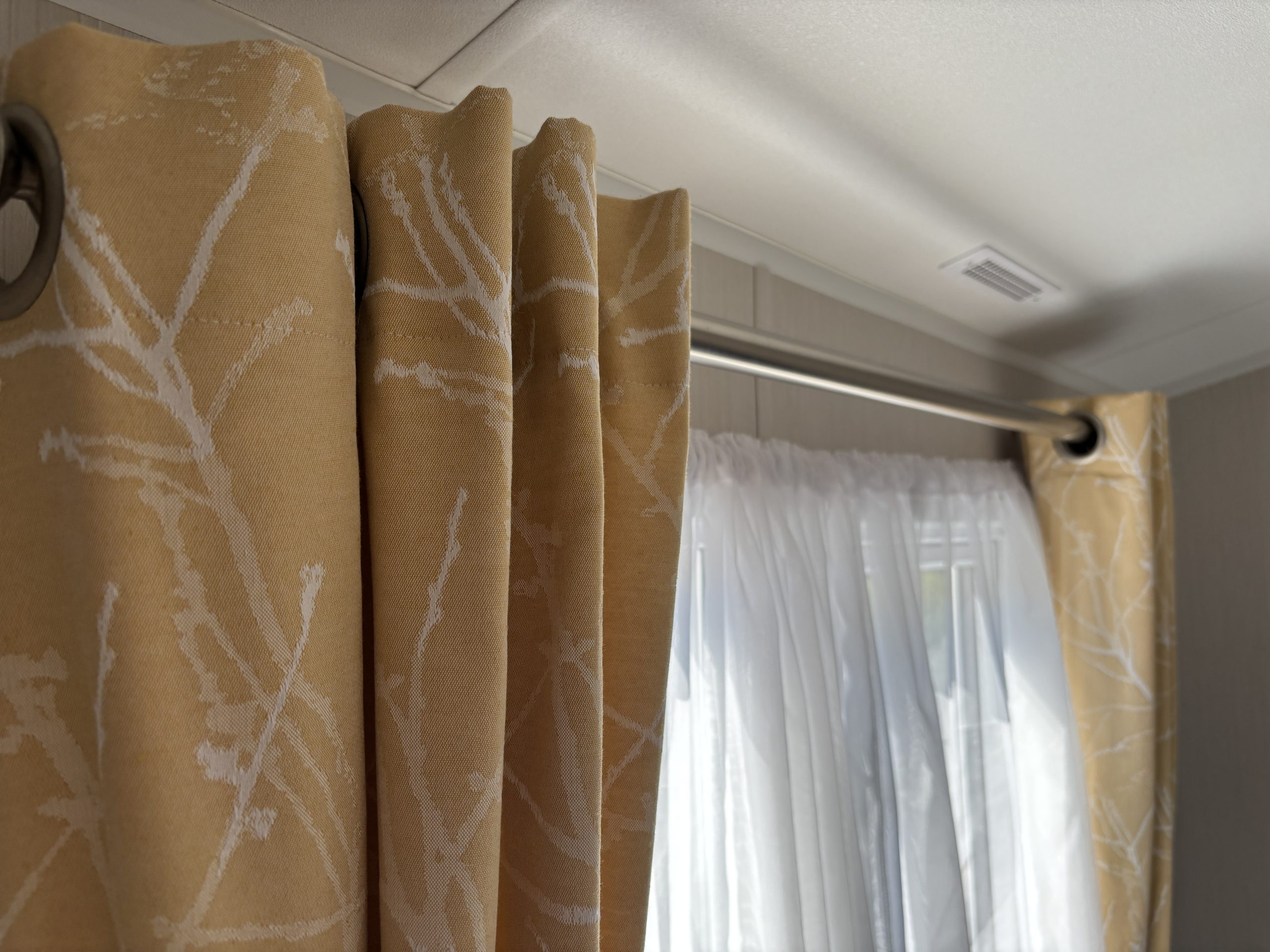 Curtains in the master bedroom in the Willerby Linwood 2022 caravan at Newton Hall Holiday Park