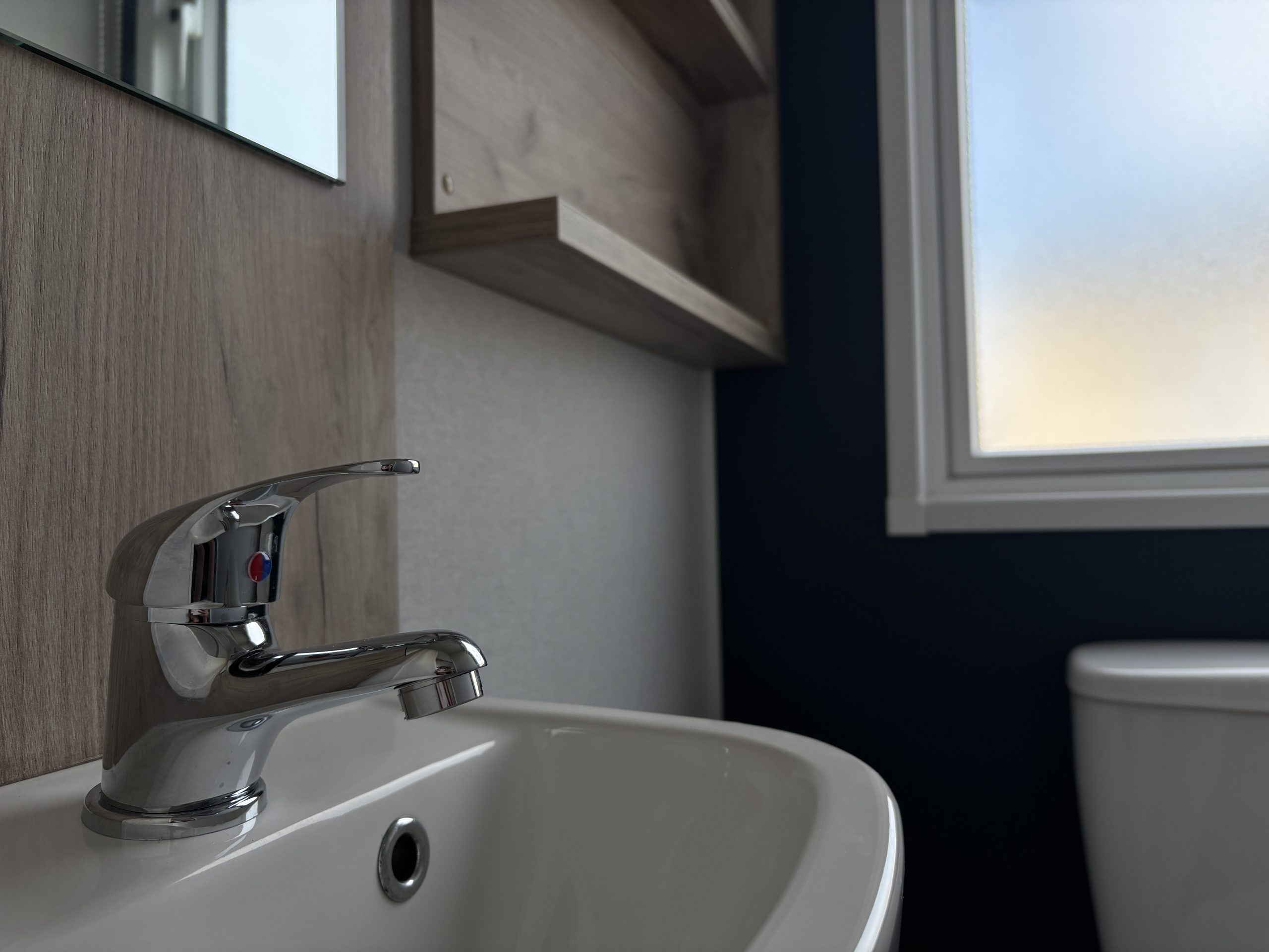 Detailed shot of the Master bedroom's ensuite in the Willerby Ashcroft 2026 at Windy Harbour Holiday Park, Partington's