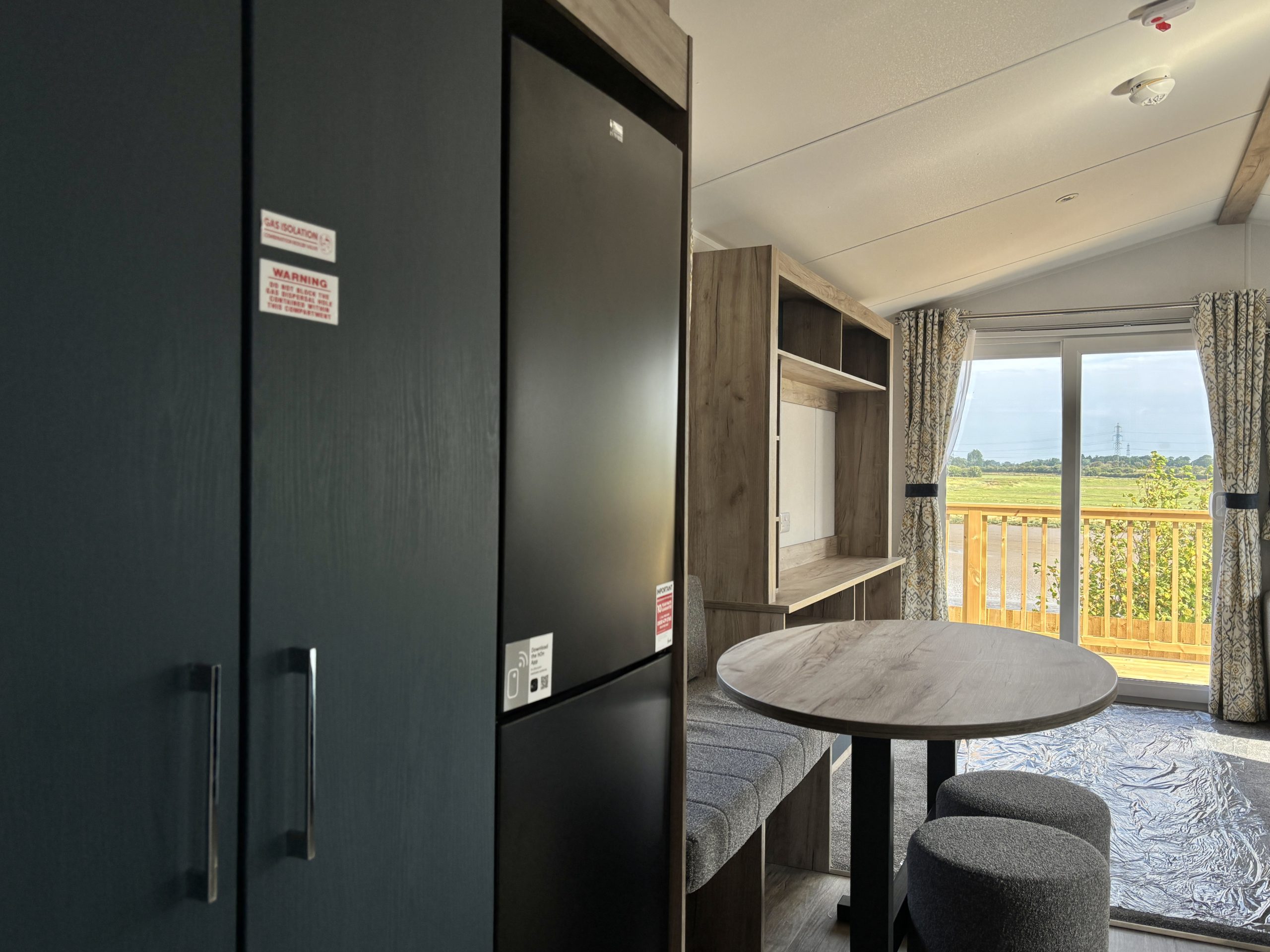 Internal shot of the dining area in the Willerby Ashcroft 2026 at Windy Harbour Holiday Park, Partington's