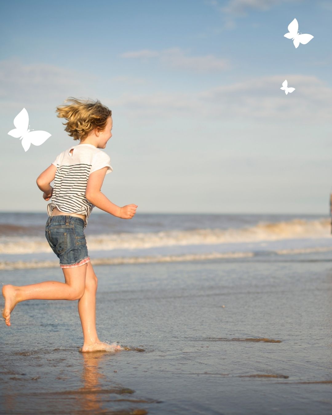 Child running on beach