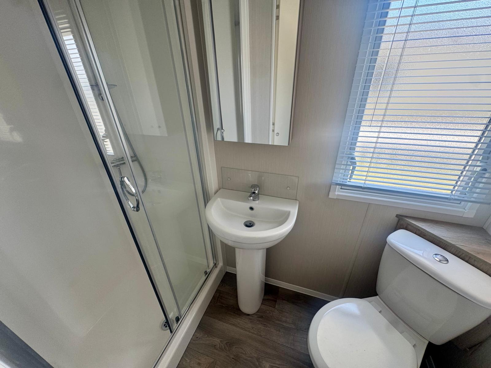 Family bathroom in Willerby Linwood 2022 caravan at Windy Harbour Holiday Park