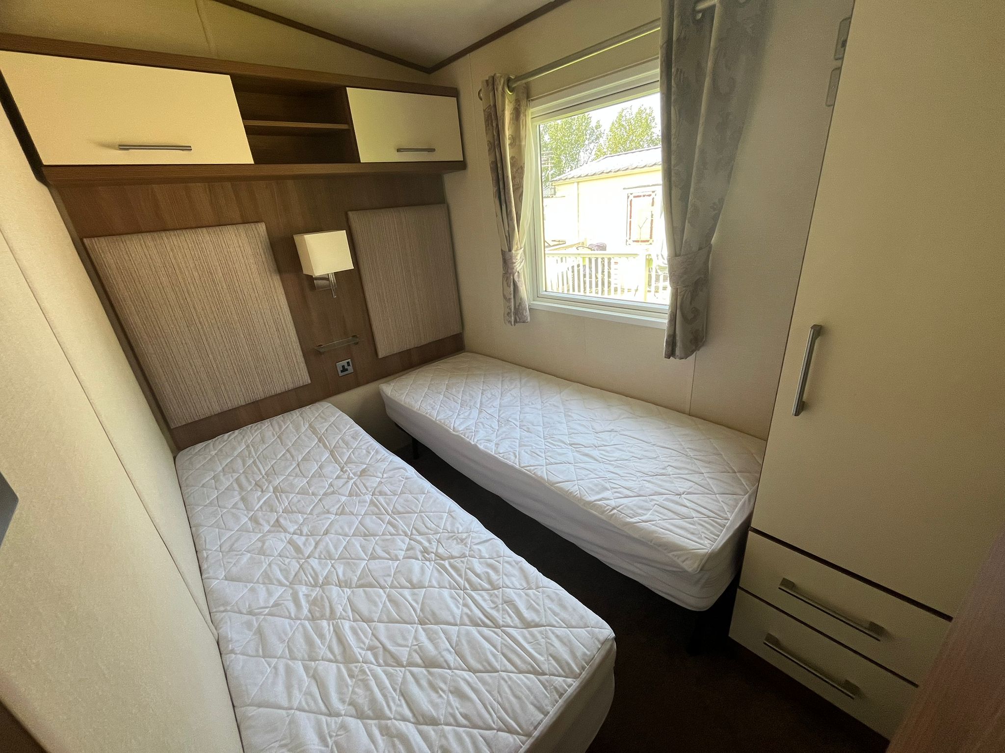 Twin bedroom in the Willerby Ashcroft 2015 caravan at Windy Harbour Holiday Park
