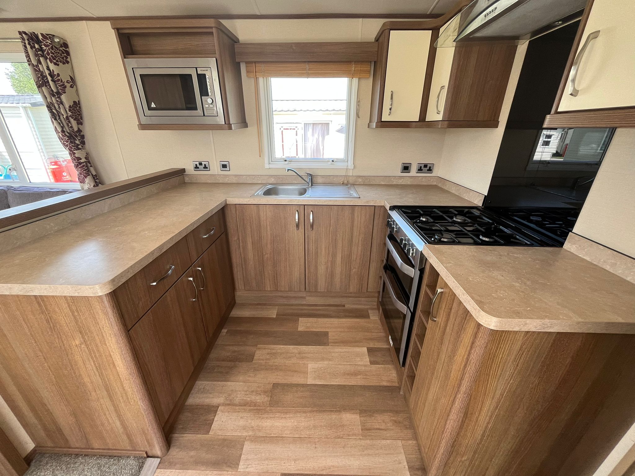 Kitchen area in the Willerby Ashcroft 2015 caravan at Windy Harbour Holiday Park