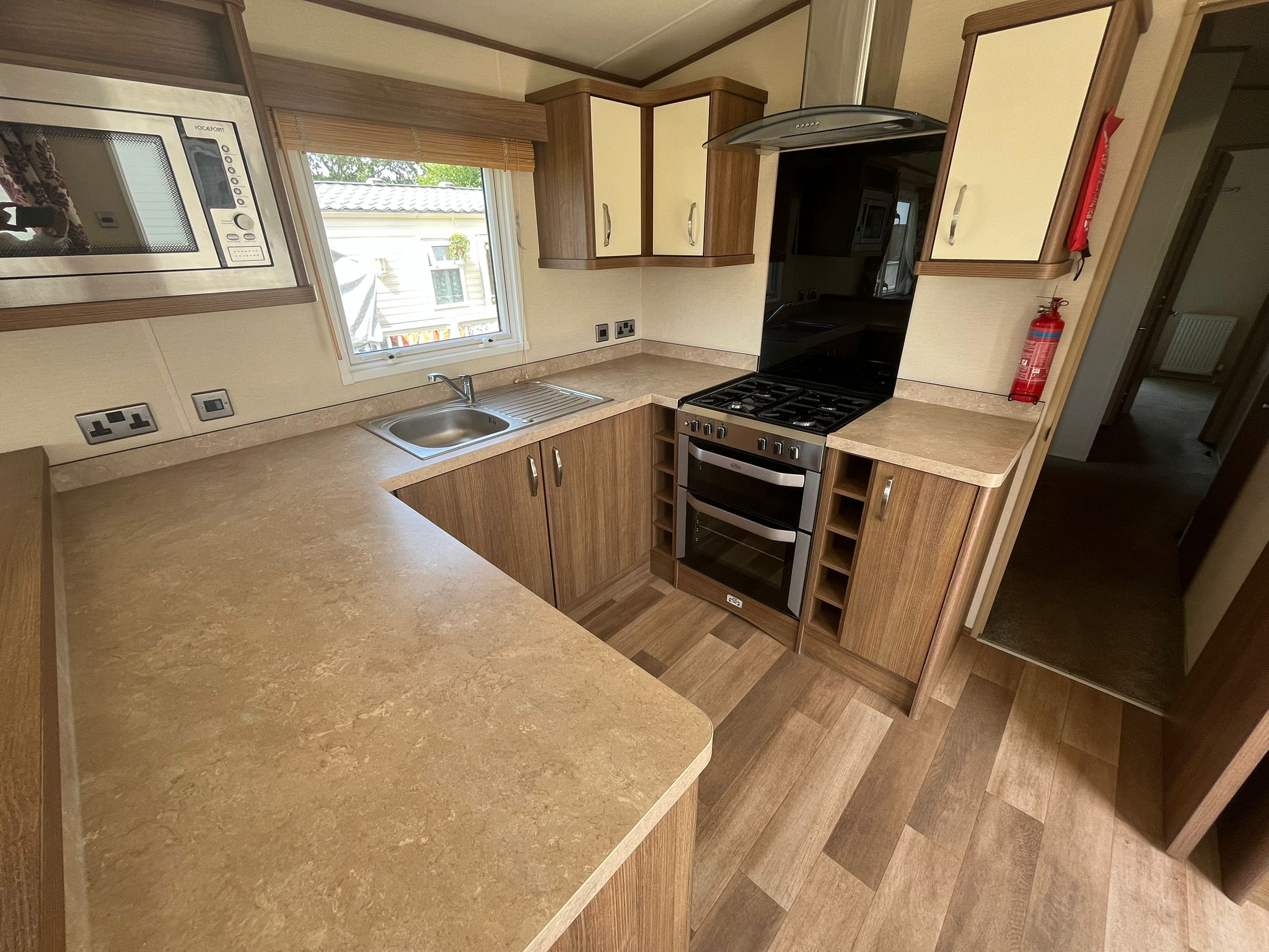 Kitchen area in the Willerby Ashcroft 2015 caravan at Windy Harbour Holiday Park