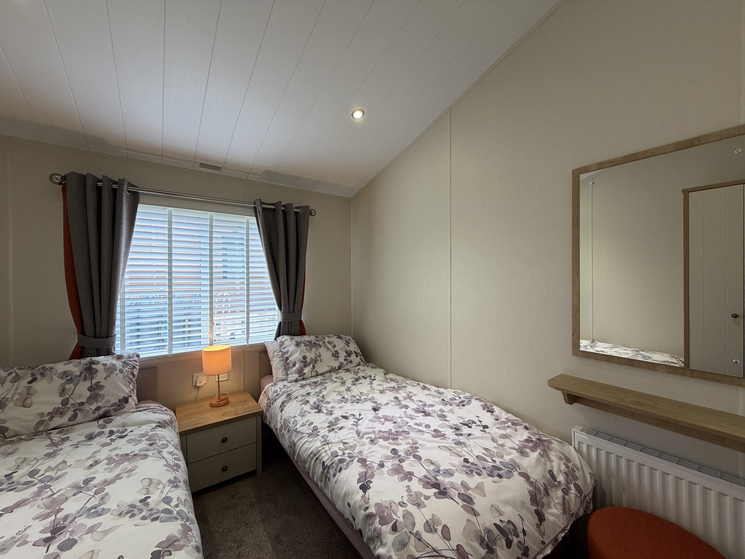 Image of the second twin room with vanity area in the Willerby Portland 2017 at Windy Harbour, a Partington's Holiday Park