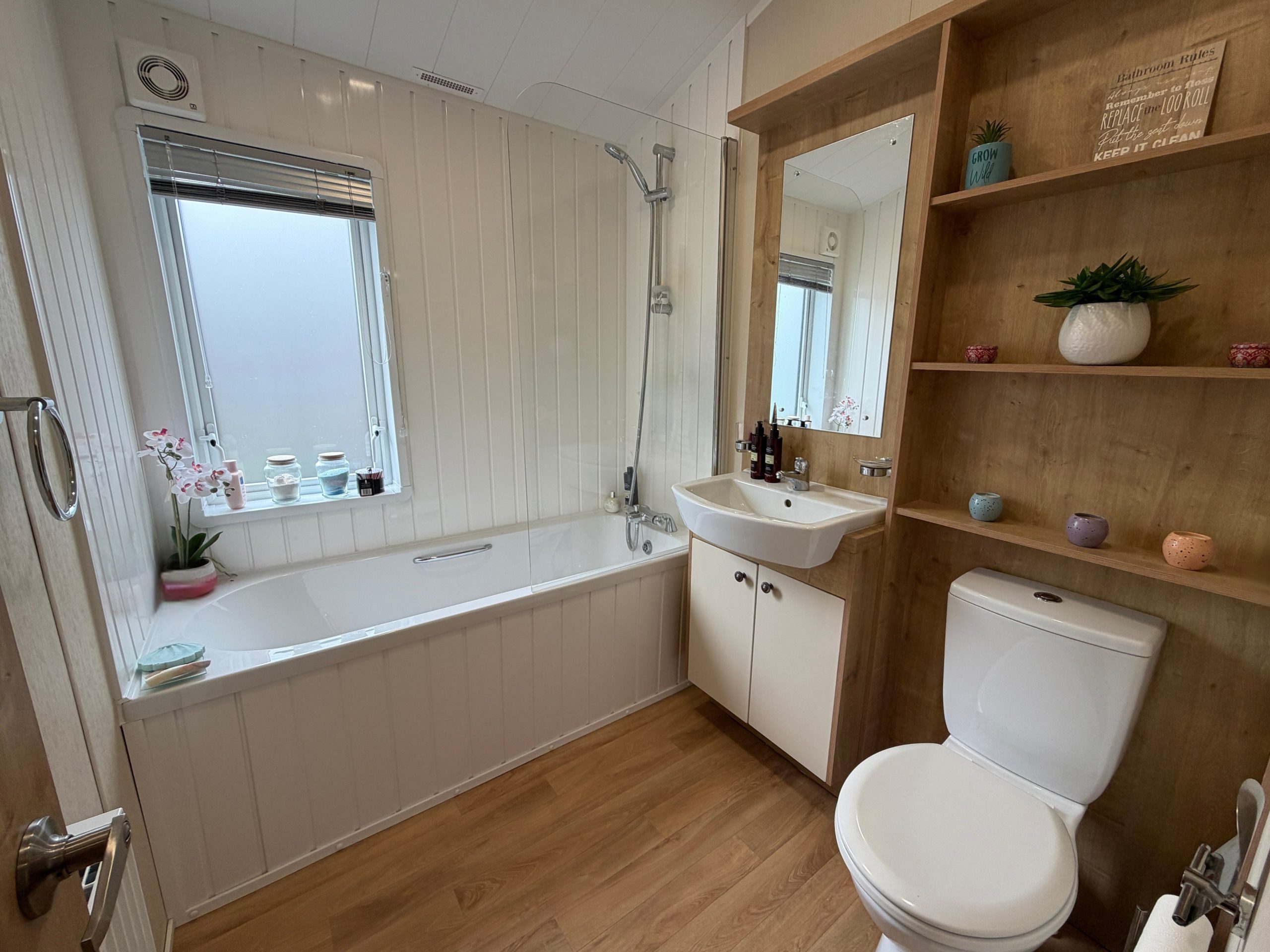 Image of the main bathroom with a bath in the Willerby Portland 2017 at Windy Harbour, a Partington's Holiday Park