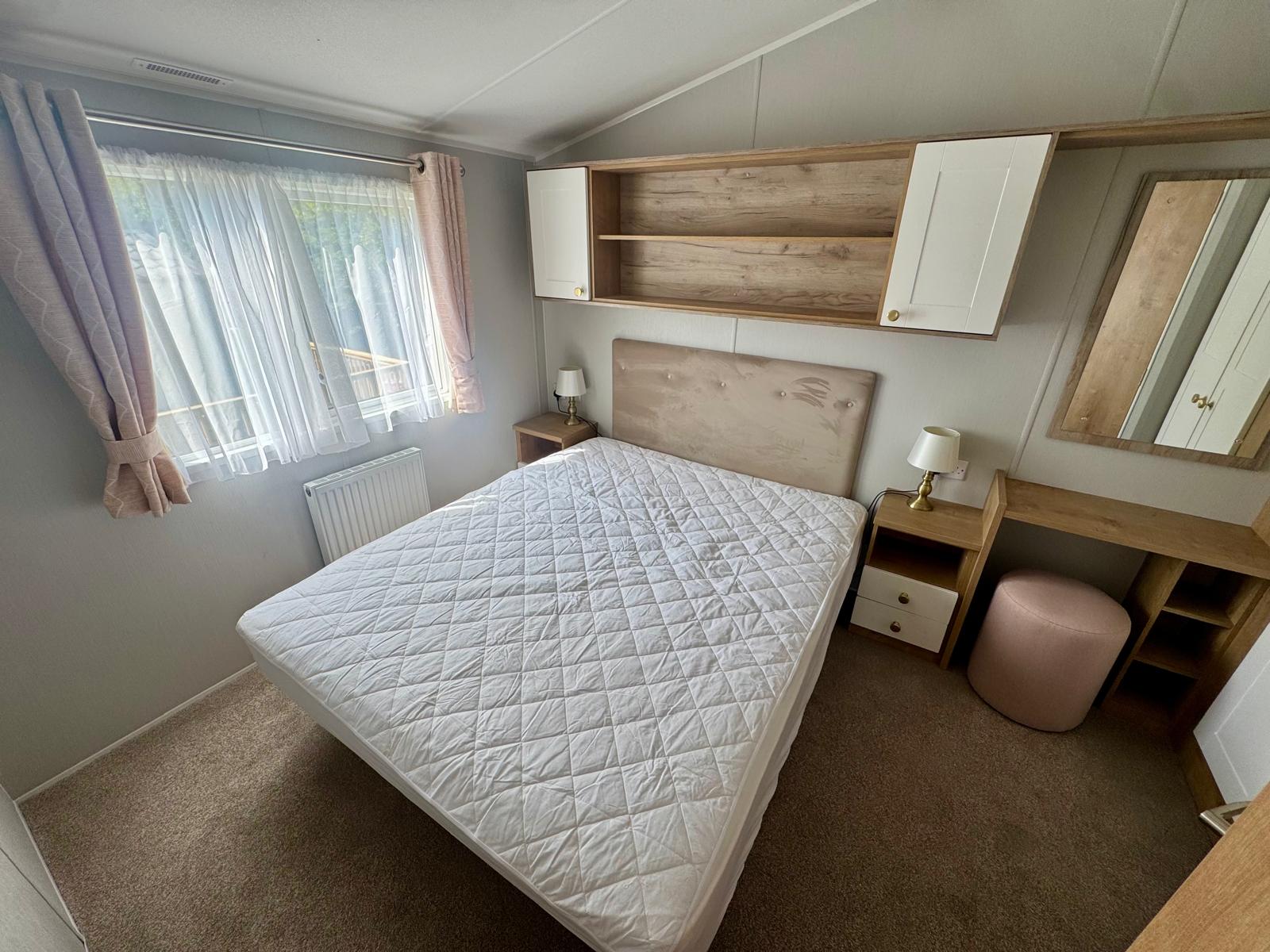 Master bedroom in the Willerby Sierra 2023 caravan at Tarn House Holiday Park