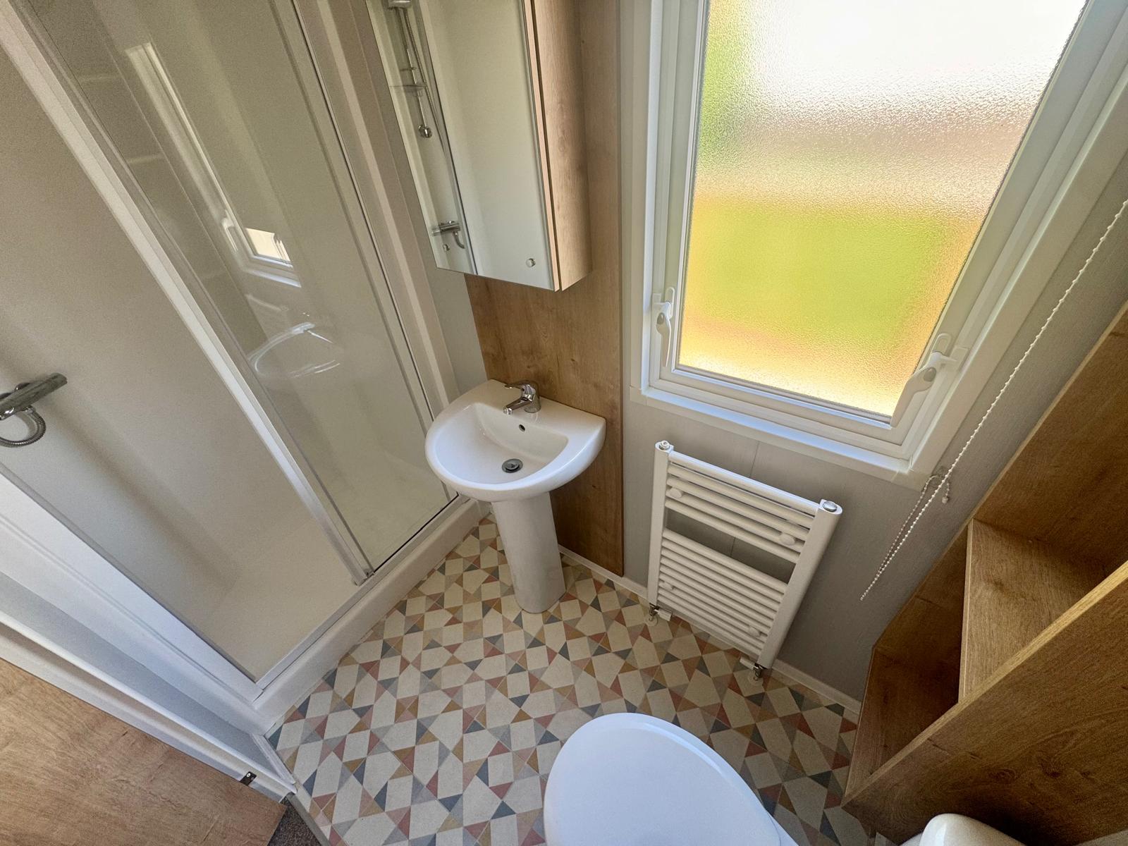 Family bathroom in the Willerby Sierra 2023 caravan at Tarn House Holiday Park
