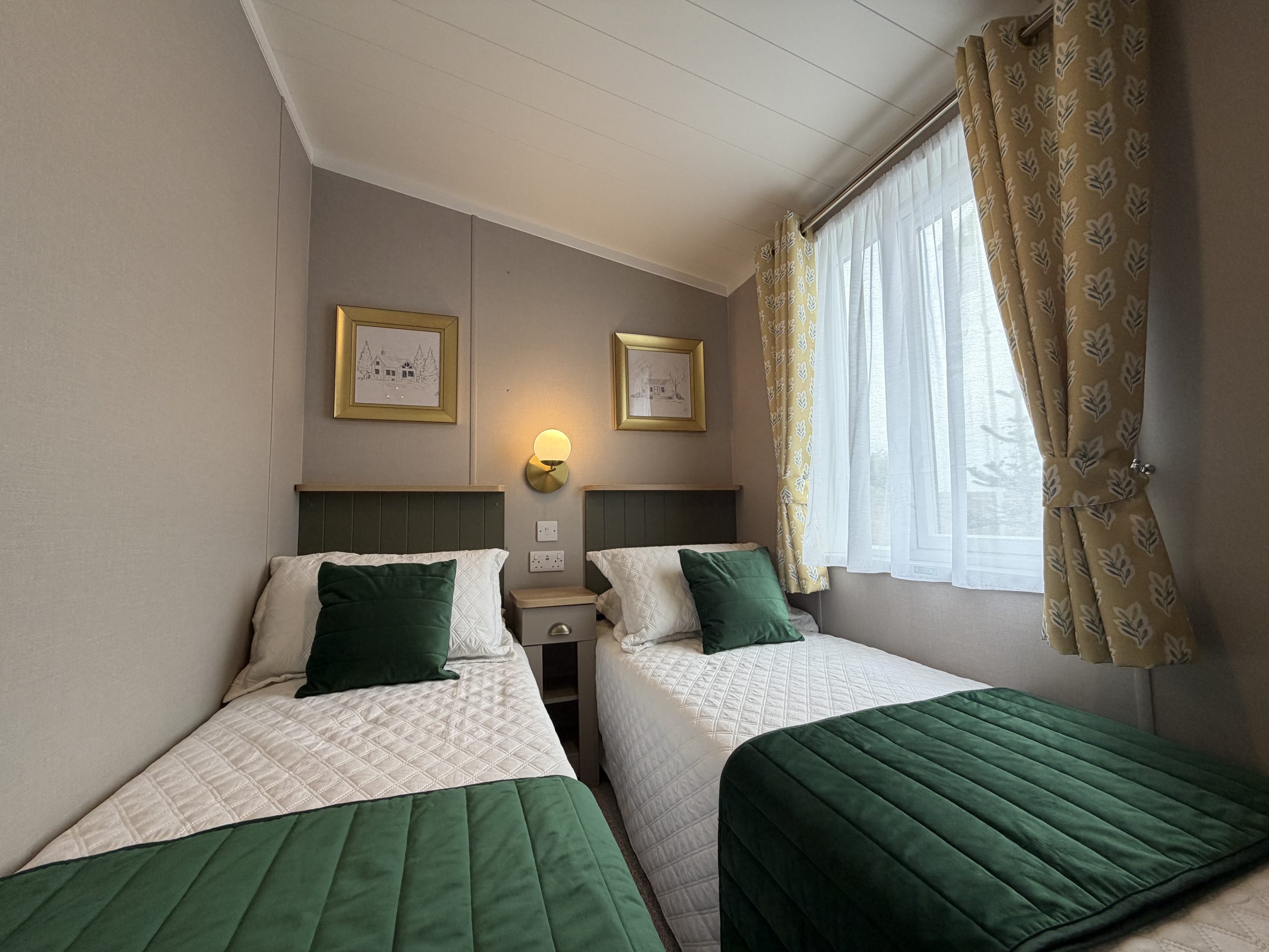 Photograph of the twin room in the Swift Vendee Lodge 2026 at Broadwater Holiday Park, Partington's