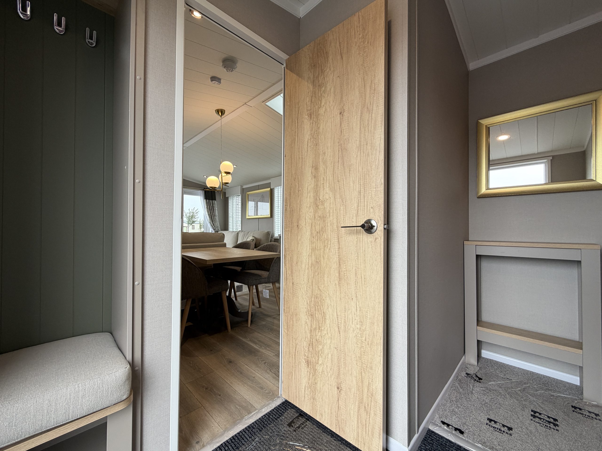 Image of the Swift Vendee Lodge 2026 entryway at Broadwater Holiday Park, Partington's