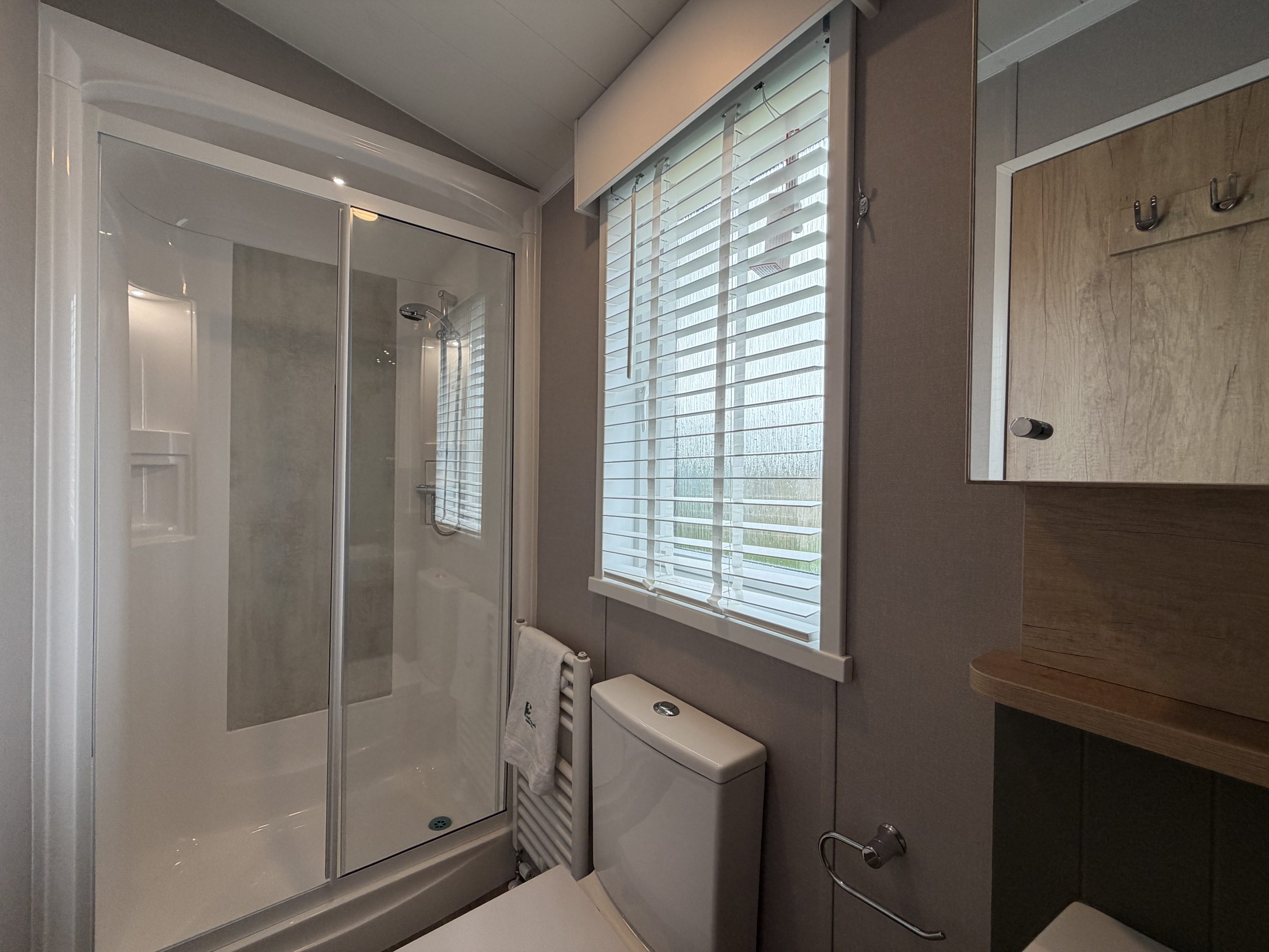 Image of the Master Bedroom's ensuite with large shower in the Swift Vendee Lodge 2026 at Broadwater Holiday Park, Partington's